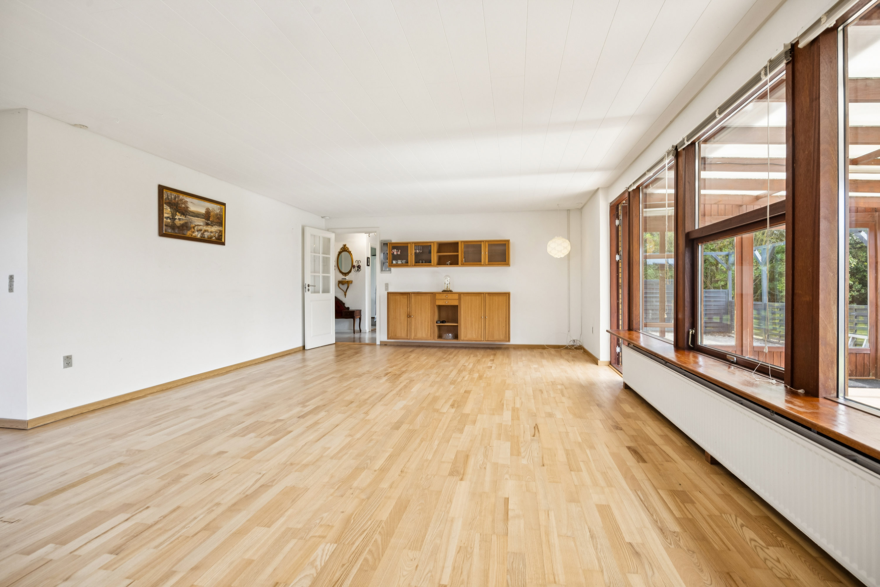 Fremhævet stue billede i fuldskærmstilstand. Billede af Strindbergparken 58, 9381 Sulsted