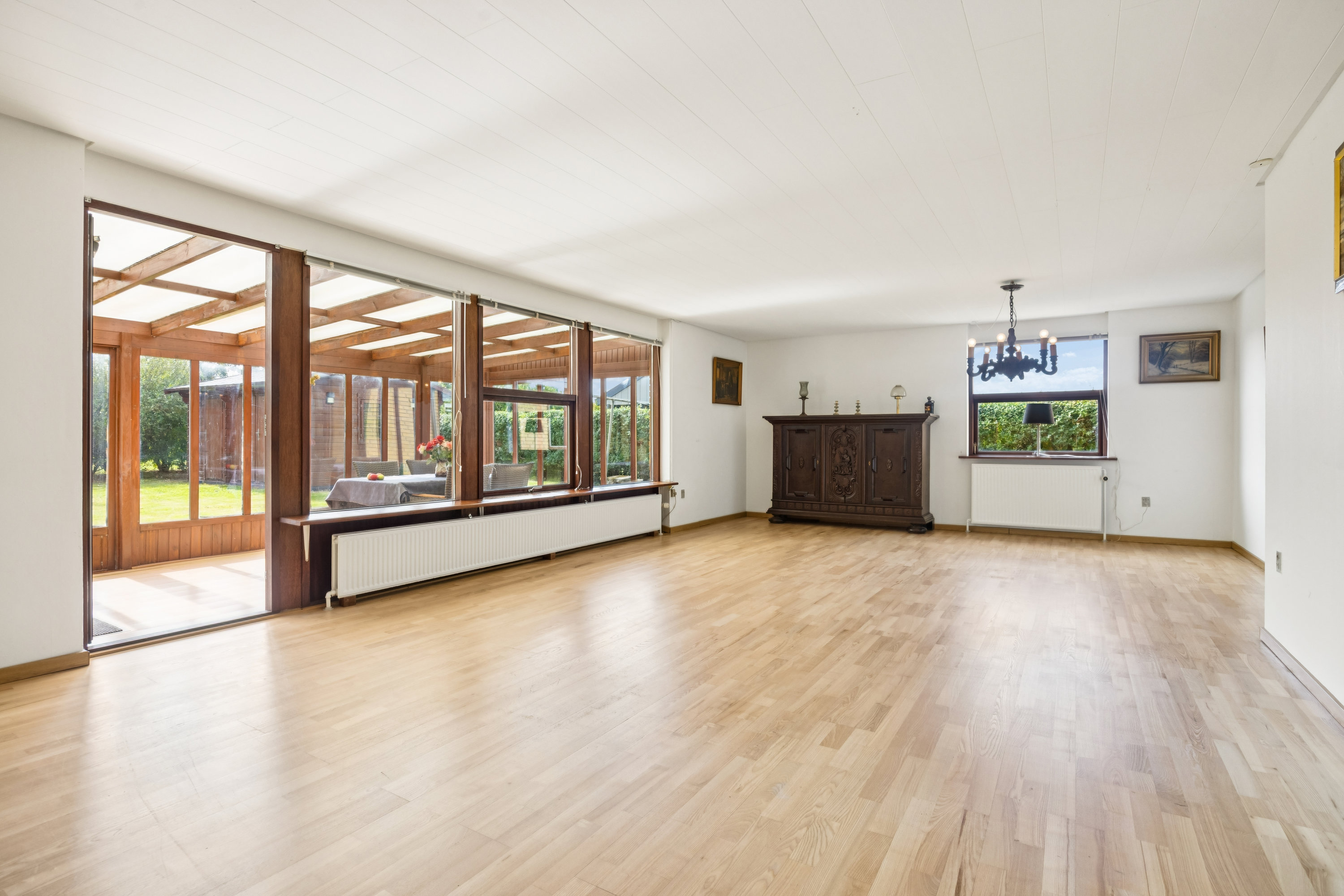 Fremhævet stue billede i fuldskærmstilstand. Billede af Strindbergparken 58, 9381 Sulsted