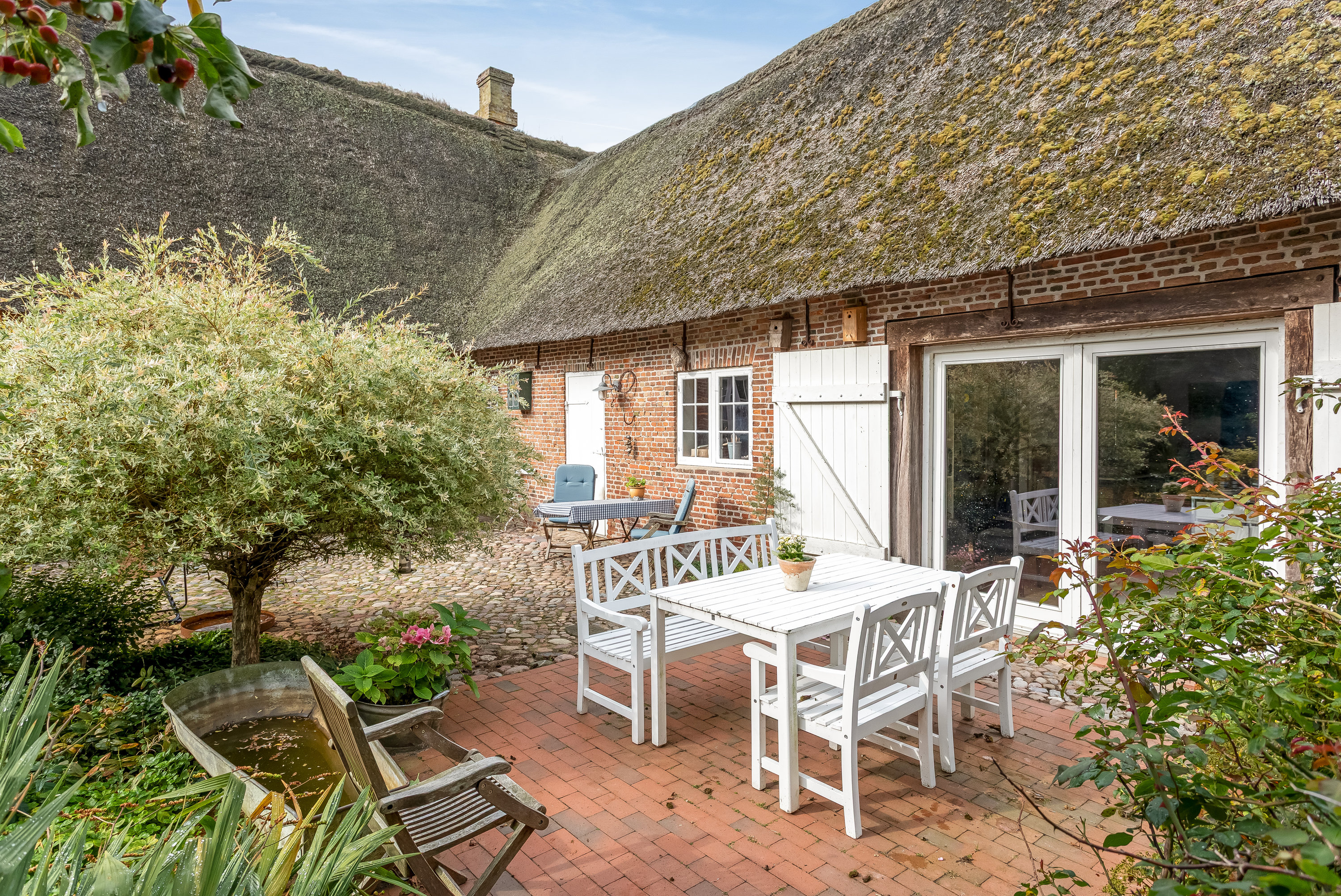 Fremhævet terrasse billede i fuldskærmstilstand. Billede af Strandvej 2, 6280 Højer