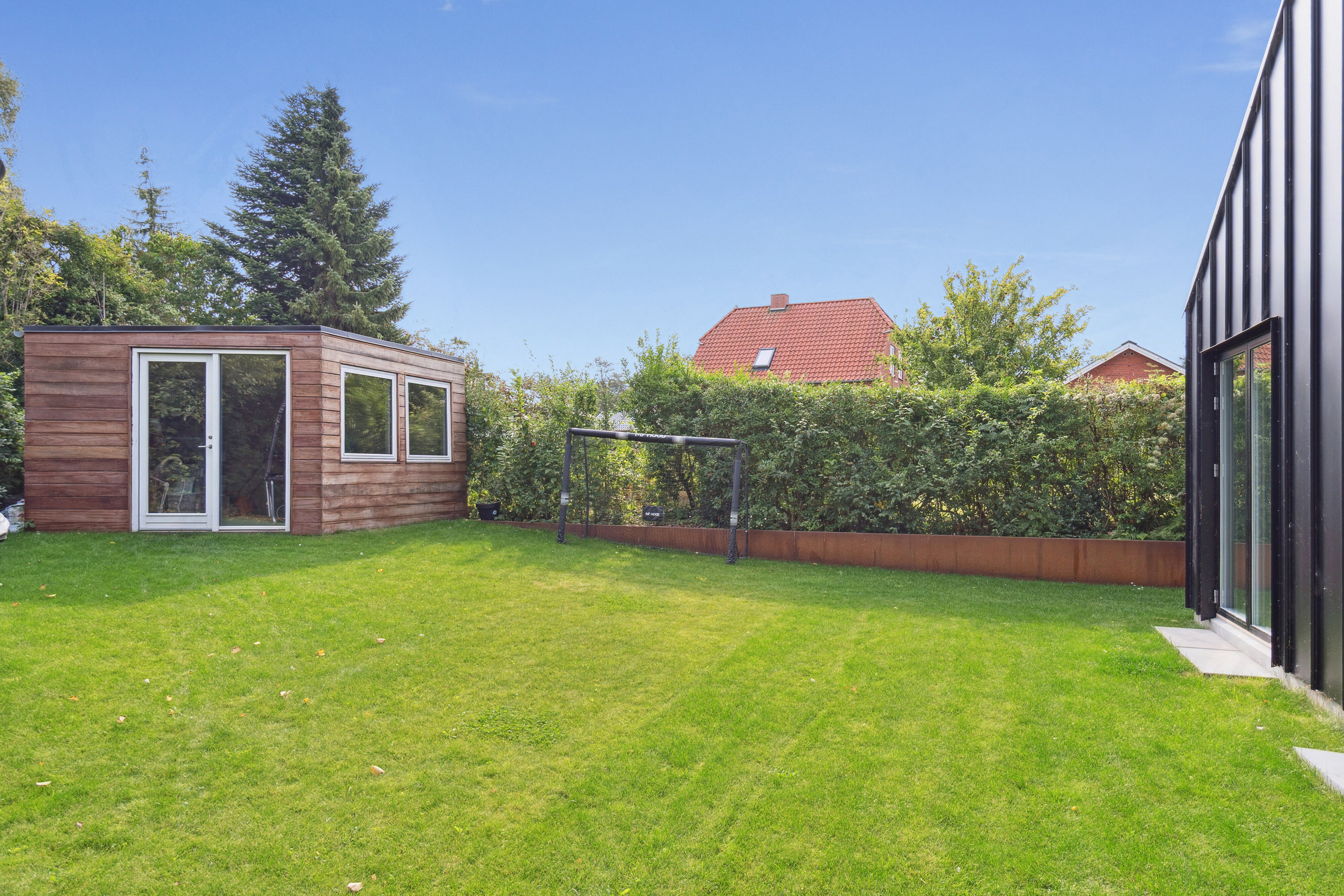 Fremhævet set fra haven billede i fuldskærmstilstand. Billede af Astersvej 7, 4200 Slagelse