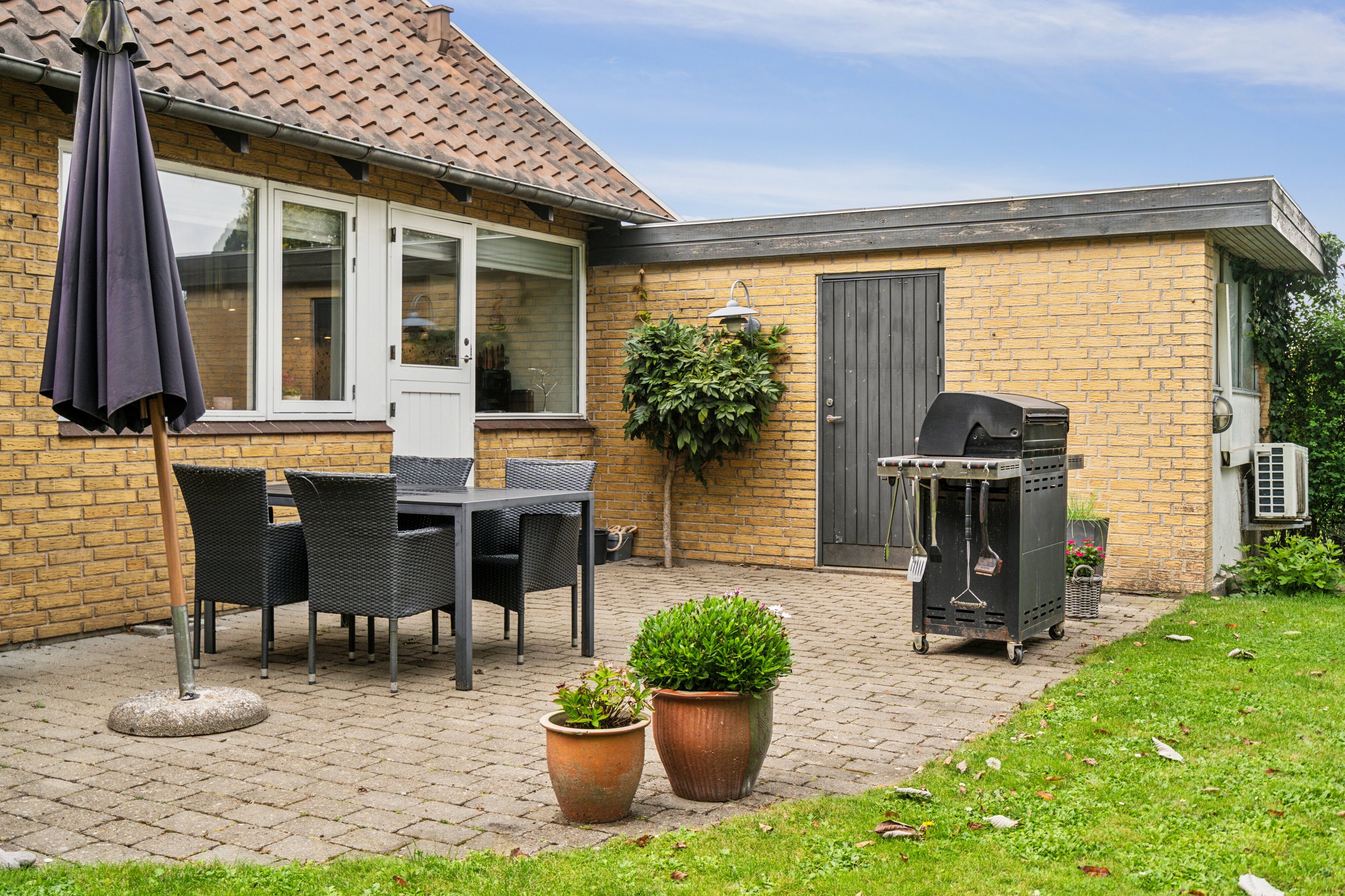 Fremhævet terrasse billede i fuldskærmstilstand. Billede af Vedbendvej 1, 5550 Langeskov