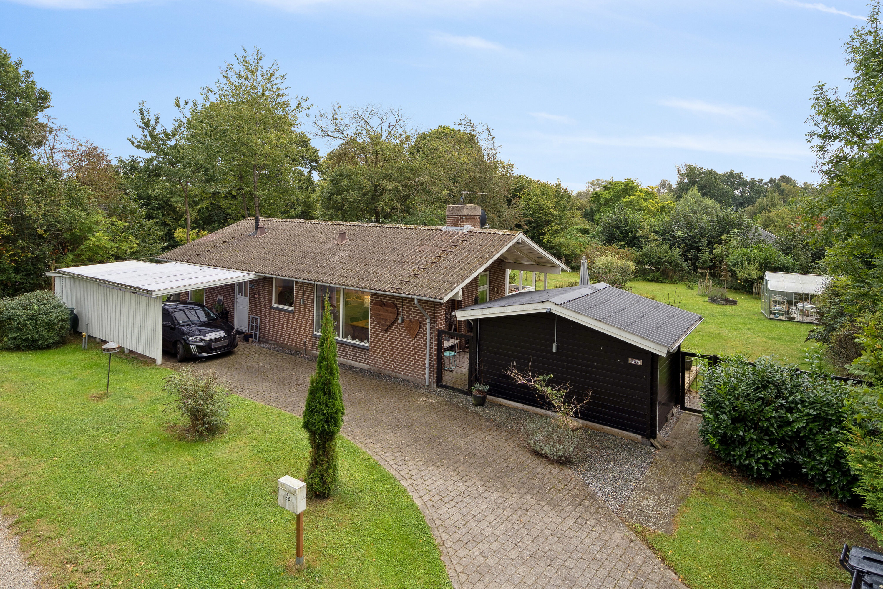 Fremhævet set fra vejen billede i fuldskærmstilstand. Billede af Hedvigsvej 8A, 4654 Faxe Ladeplads