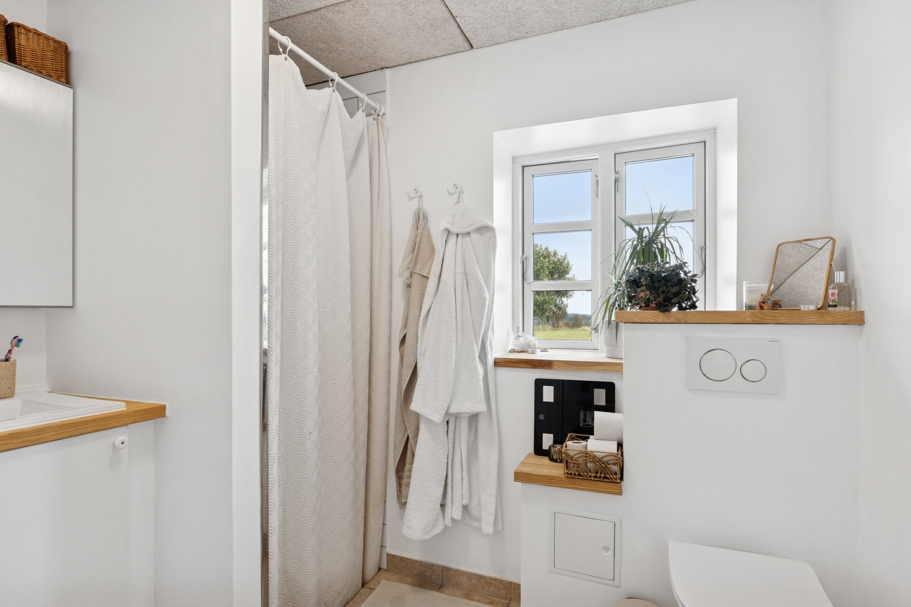 Fremhævet badeværelse lejlighed billede i fuldskærmstilstand. Billede af Stenbjergvej 8, 4550 Asnæs