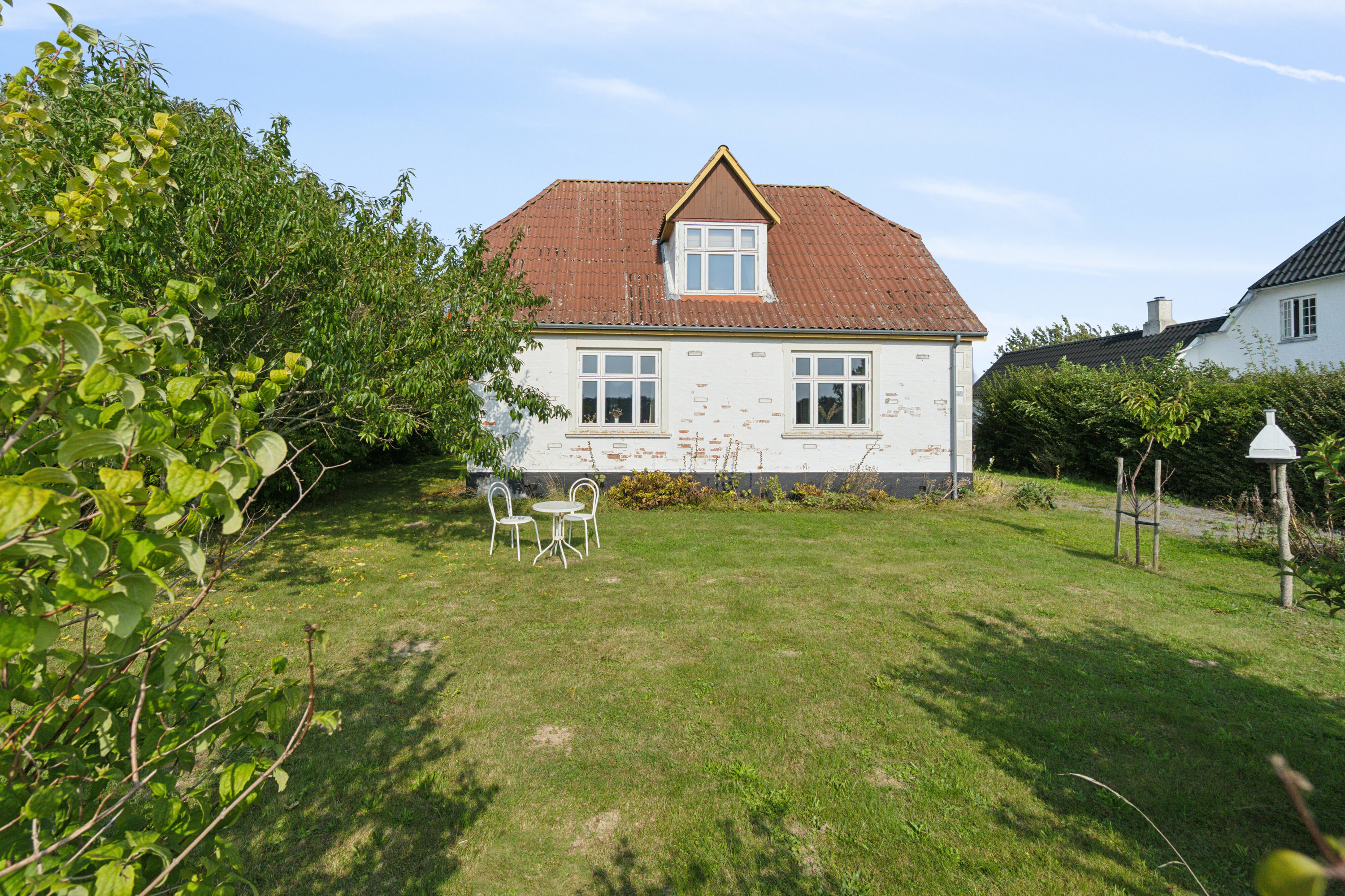 Miniaturebillede 1: set fra haven. Billede af Stavsdalvej 12, Østerlars, 3760 Gudhjem