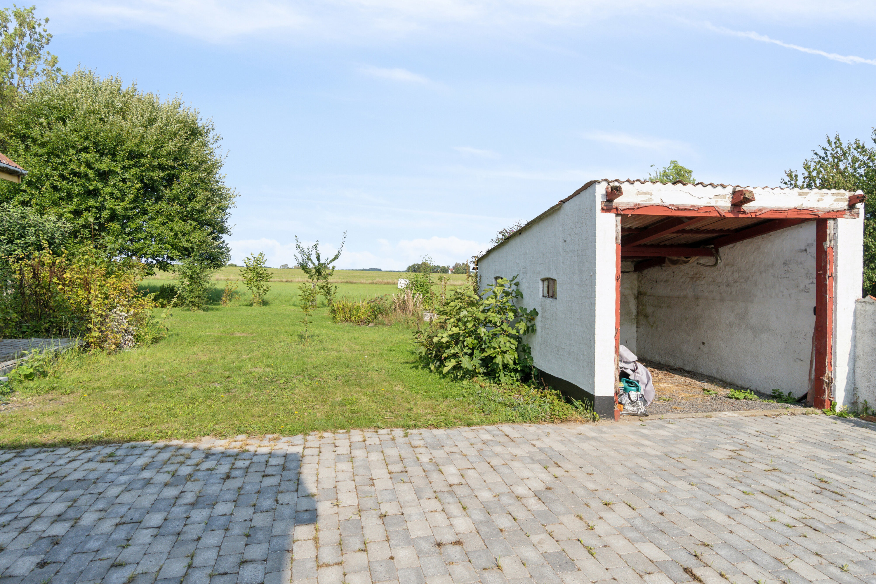 Miniaturebillede 2: set fra haven. Billede af Stavsdalvej 12, Østerlars, 3760 Gudhjem