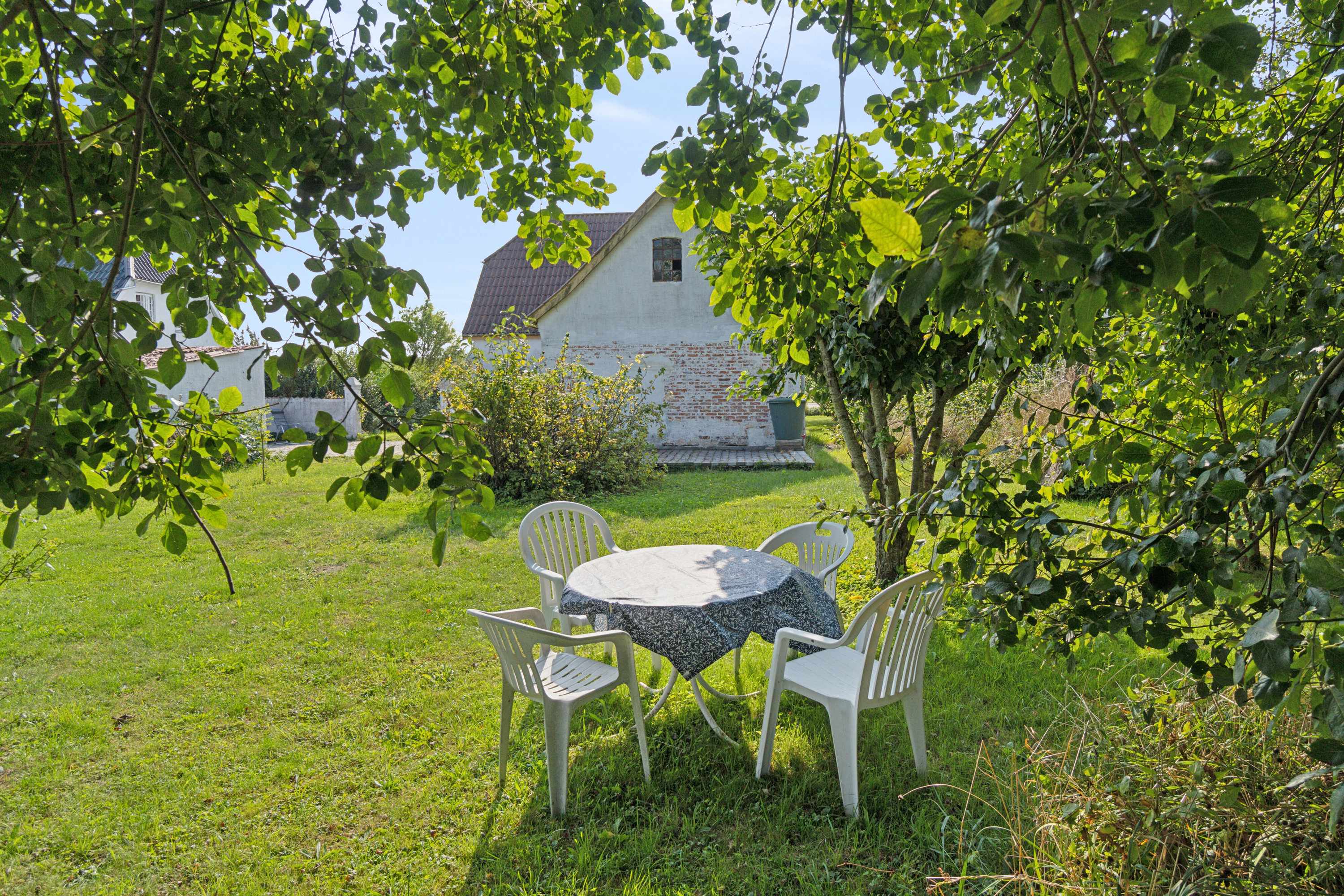 Fremhævet terrasse billede i fuldskærmstilstand. Billede af Stavsdalvej 12, Østerlars, 3760 Gudhjem