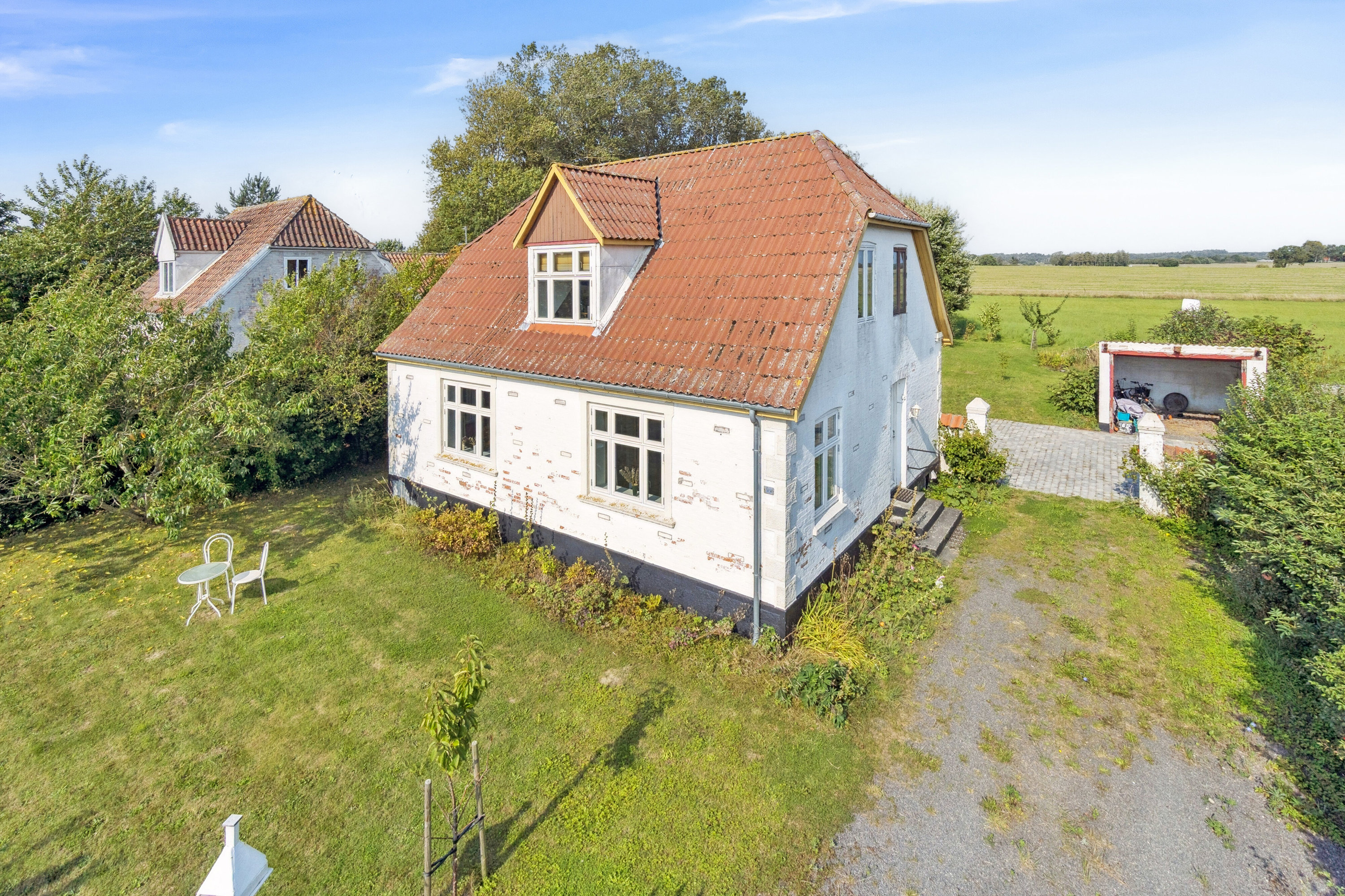 Fremhævet set fra vejen billede i fuldskærmstilstand. Billede af Stavsdalvej 12, Østerlars, 3760 Gudhjem