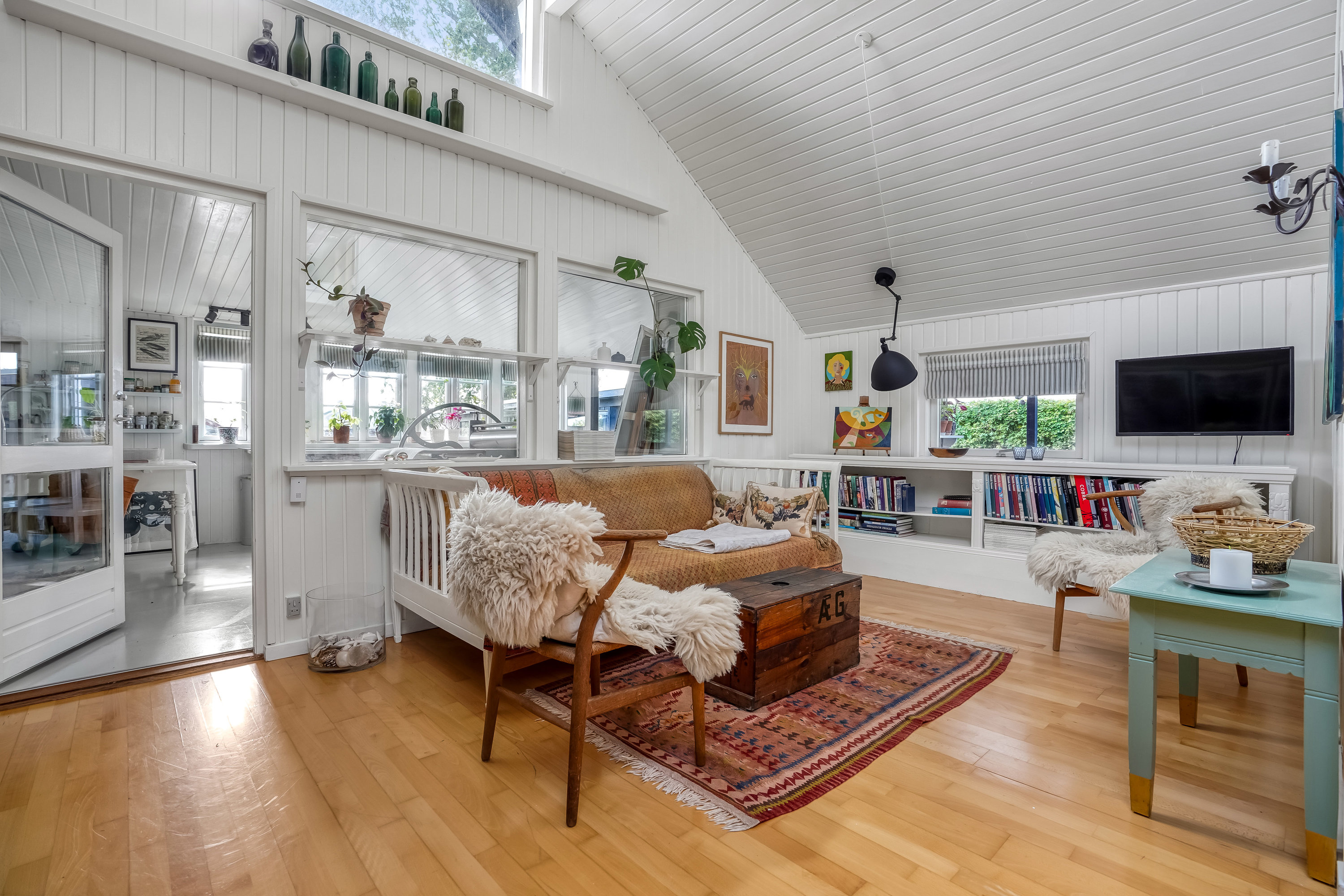 Fremhævet stue billede i fuldskærmstilstand. Billede af Ø.Strandløkkevej 3, 5300 Kerteminde