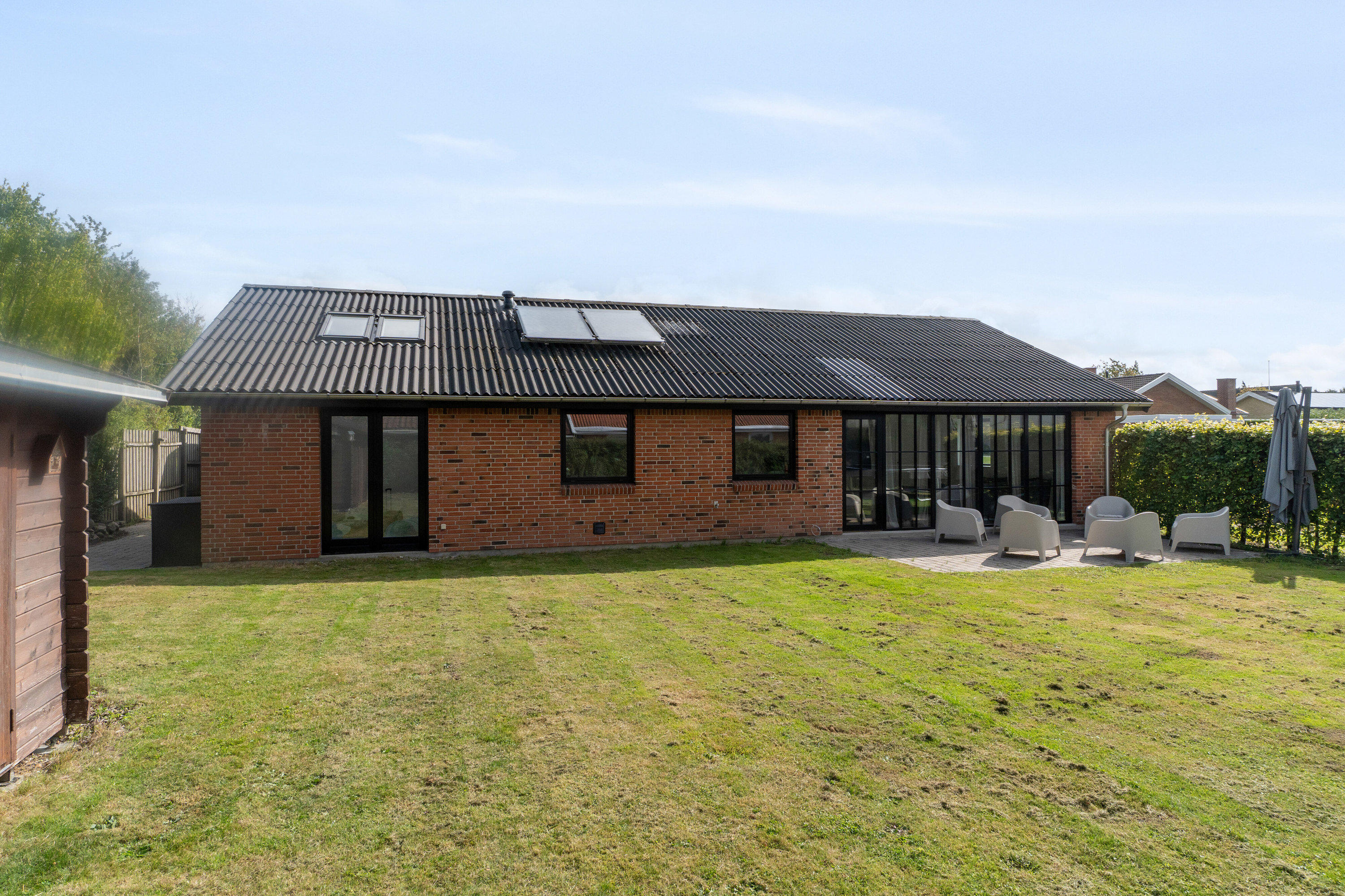 Fremhævet set fra haven billede i fuldskærmstilstand. Billede af Granitvej 33, Fensmark, 4684 Holmegaard