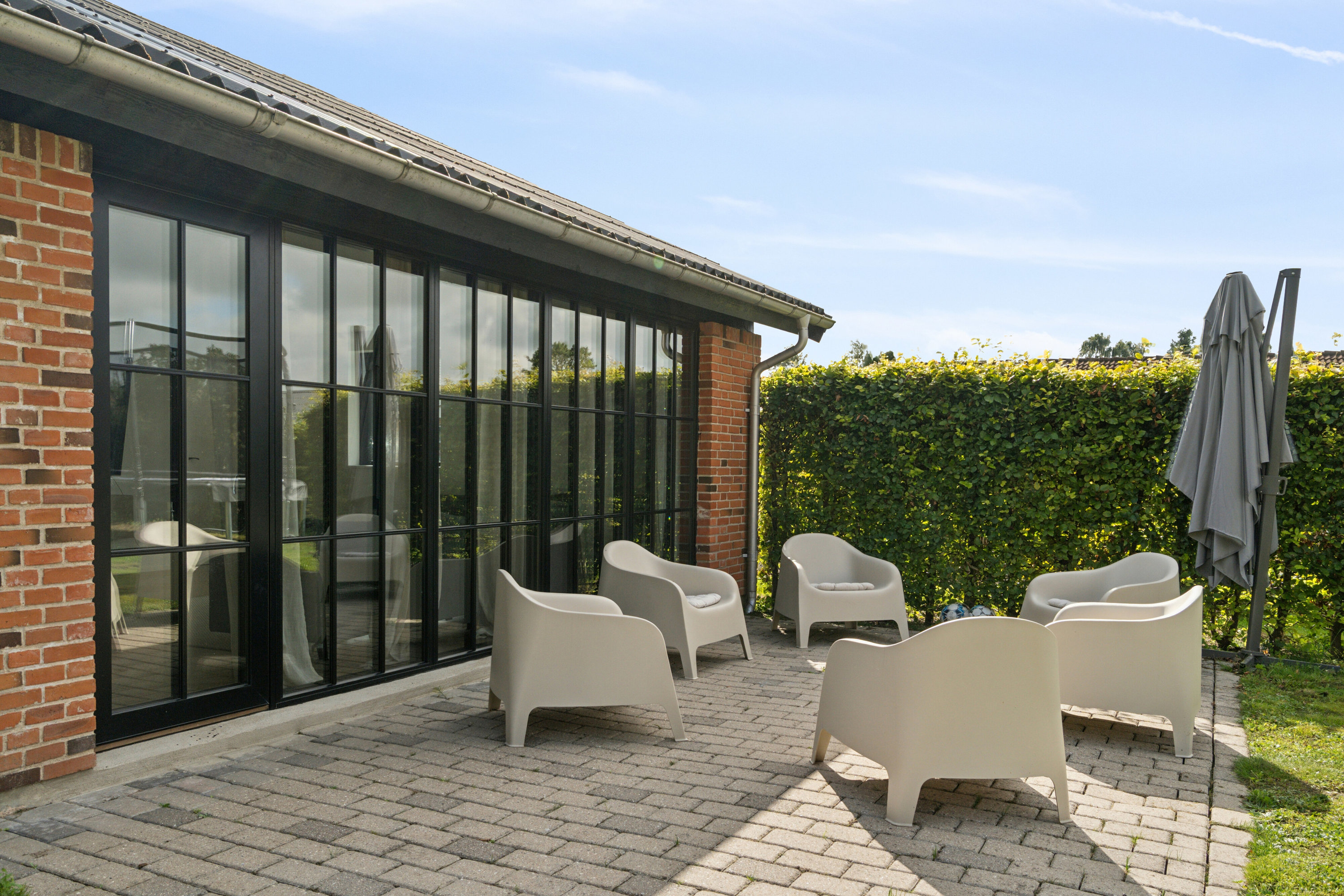 Fremhævet terrasse billede i fuldskærmstilstand. Billede af Granitvej 33, Fensmark, 4684 Holmegaard