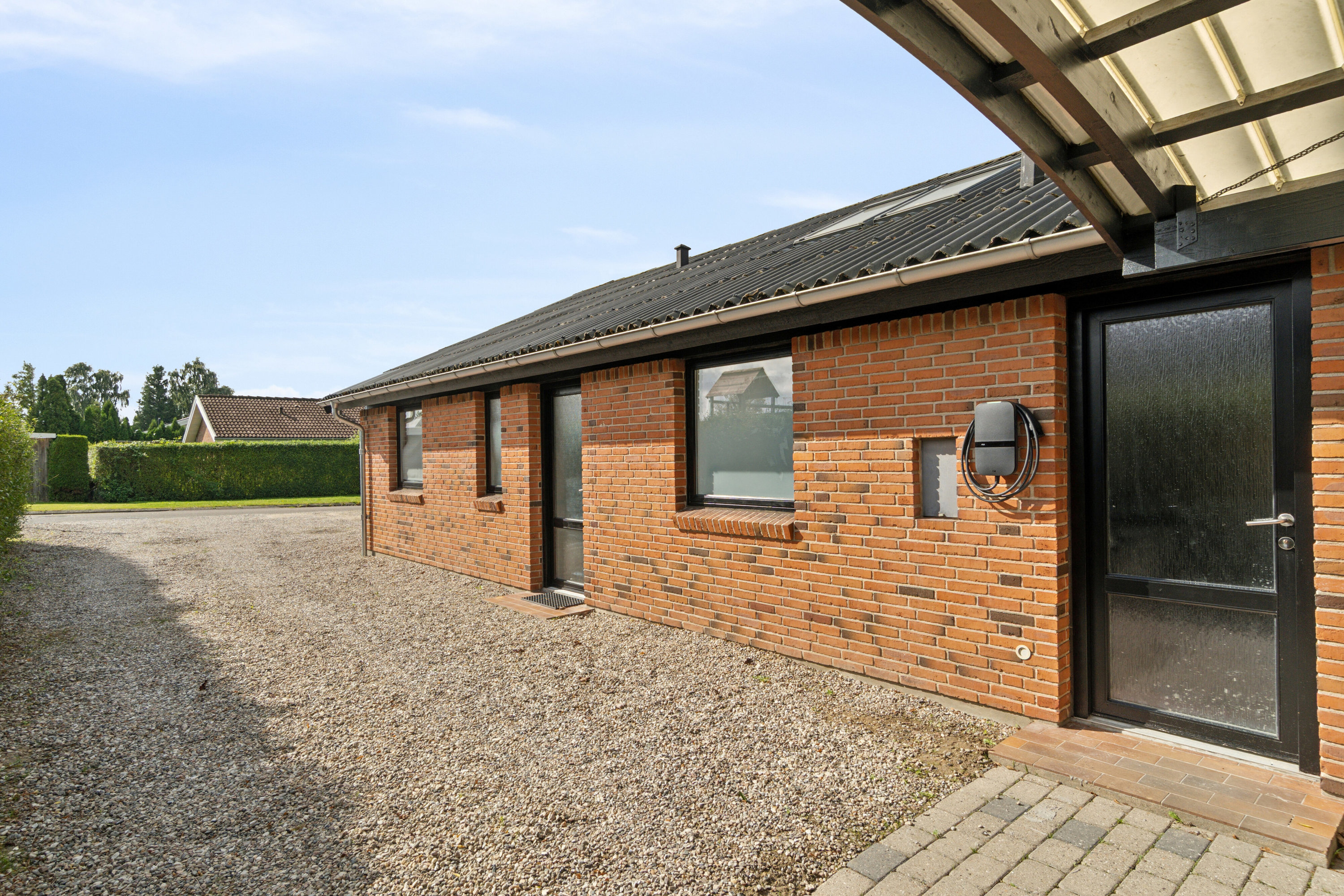 Fremhævet set fra vejen billede i fuldskærmstilstand. Billede af Granitvej 33, Fensmark, 4684 Holmegaard