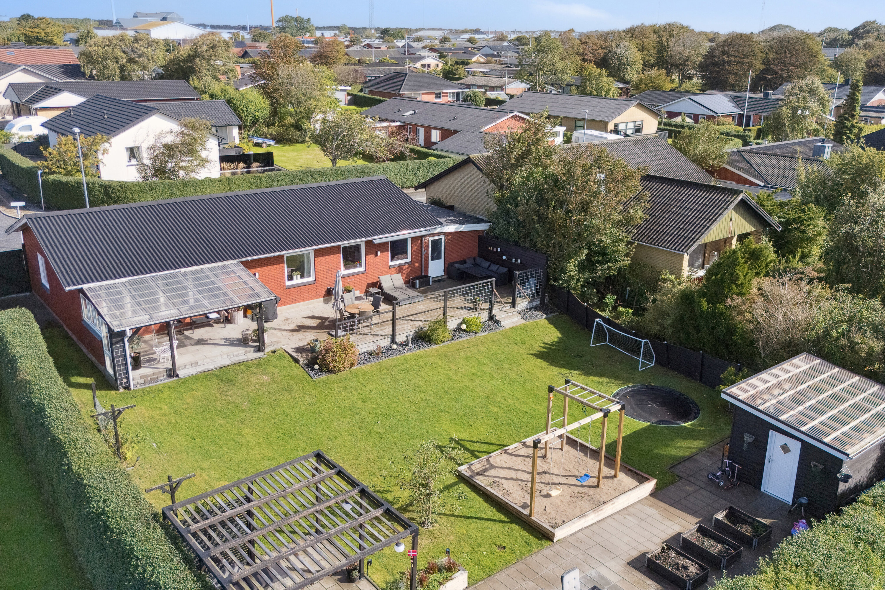 Villa: Set fra haven på Tranevej 10, 7700 Thisted