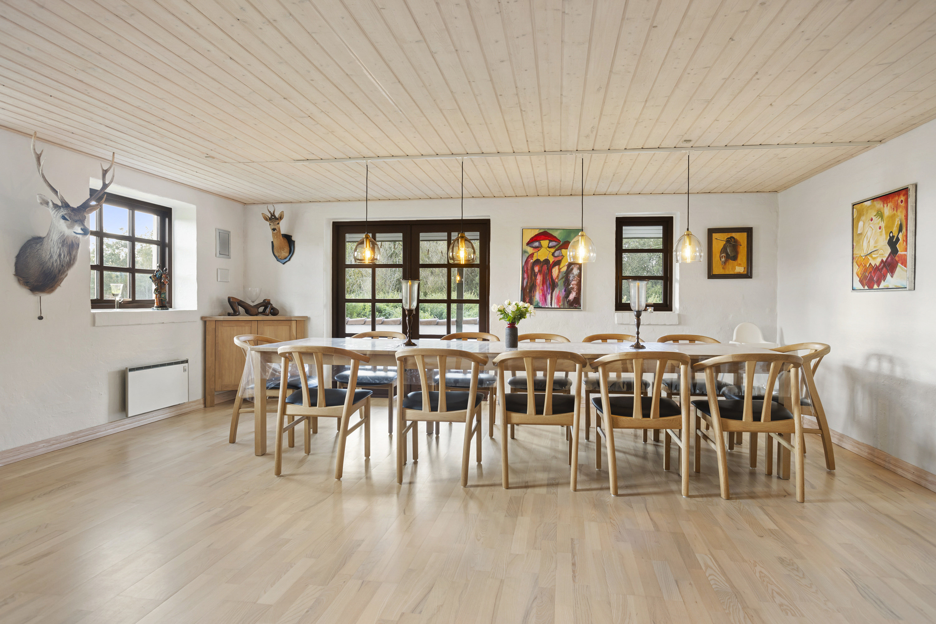 Fremhævet stue billede i fuldskærmstilstand. Billede af Solsbækvej 276, Lyngså, 9300 Sæby