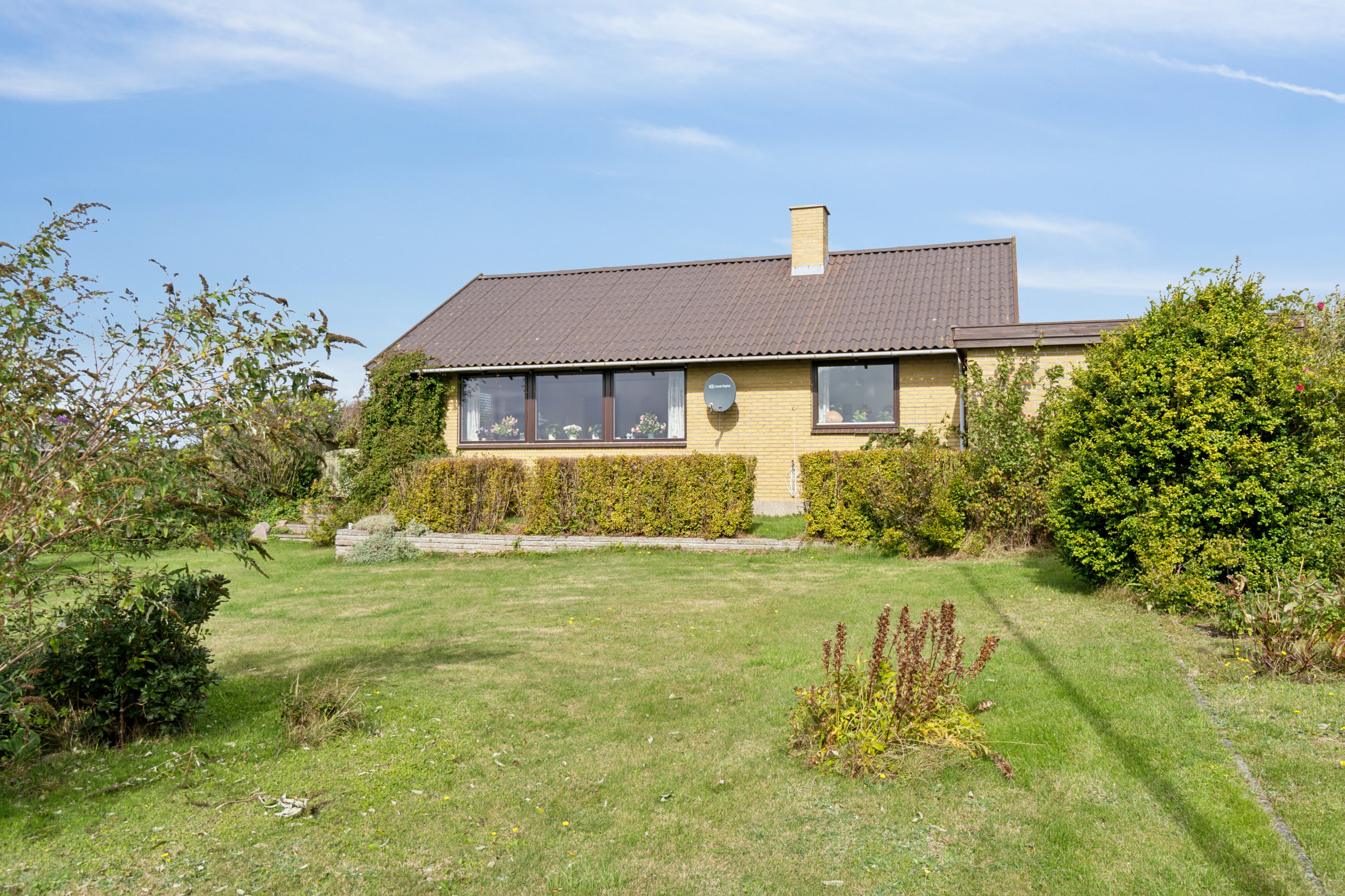 Fremhævet set fra haven billede i fuldskærmstilstand. Billede af Bakkedraget 14, Drøsselbjerg Strand, 4200 Slagelse