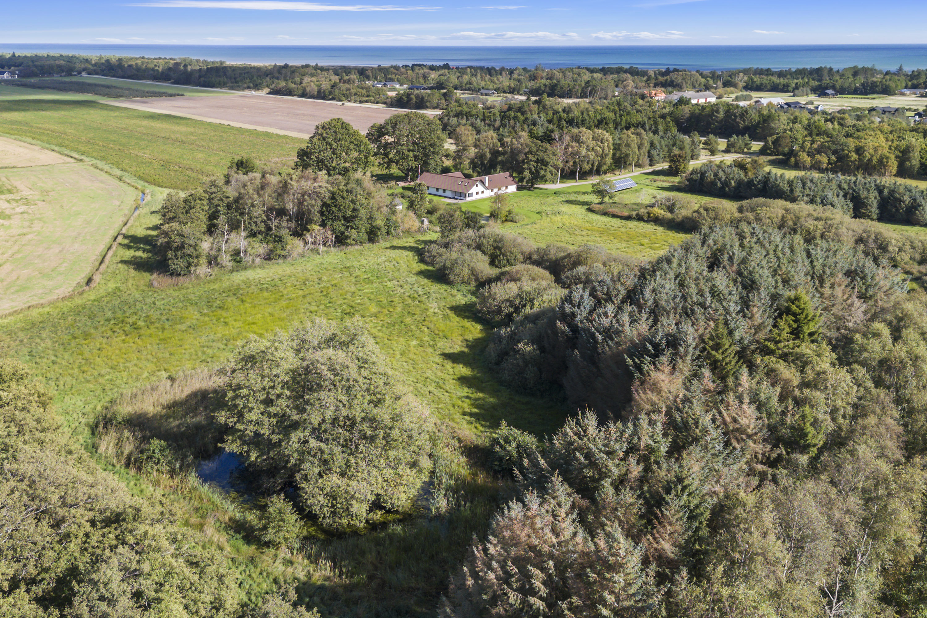 Fremhævet luftfoto billede i fuldskærmstilstand. Billede af Solsbækvej 276, Lyngså, 9300 Sæby