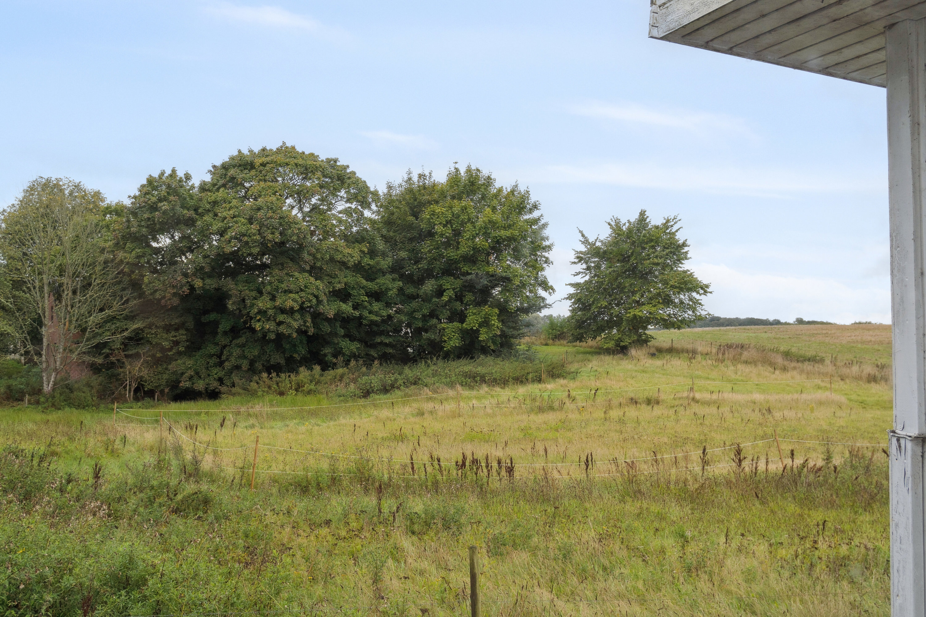 Fremhævet set fra haven billede i fuldskærmstilstand. Billede af Teglværksvej 51, Ølsted, 8723 Løsning