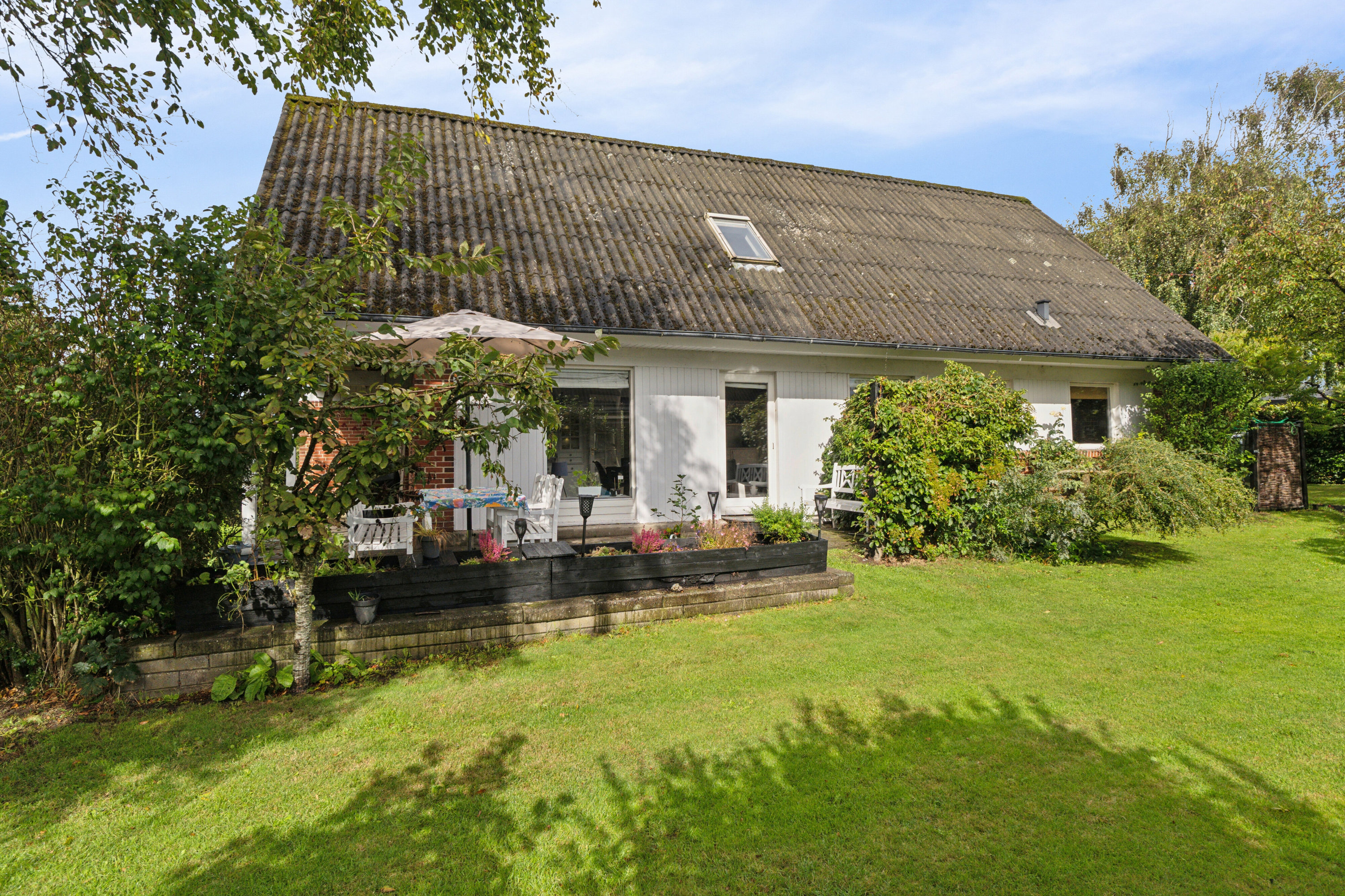 Fremhævet set fra haven billede i fuldskærmstilstand. Billede af Eskærvej 4, 9800 Hjørring