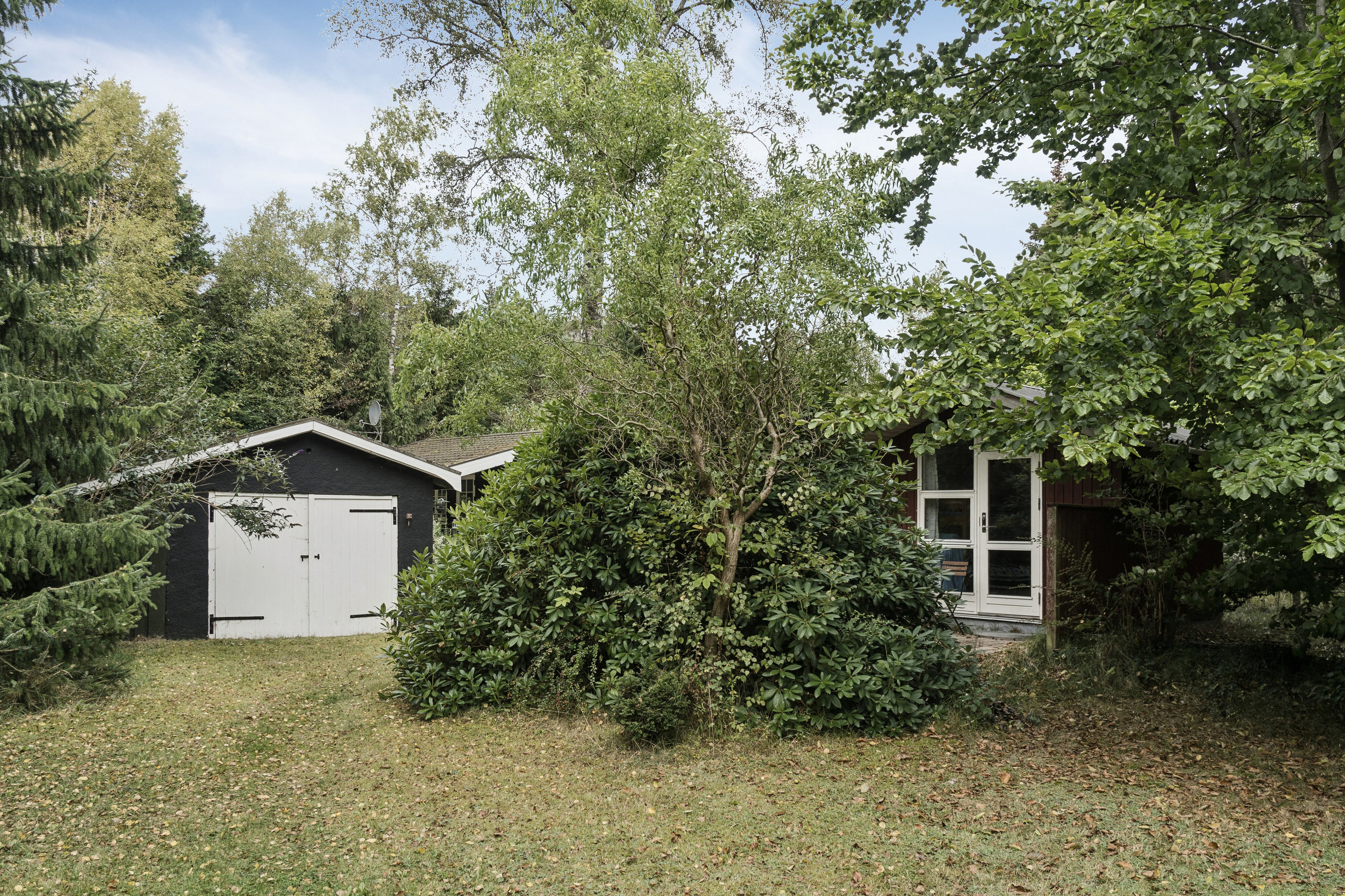 Fremhævet set fra haven billede i fuldskærmstilstand. Billede af Elvervangen 15, 4500 Nykøbing Sj