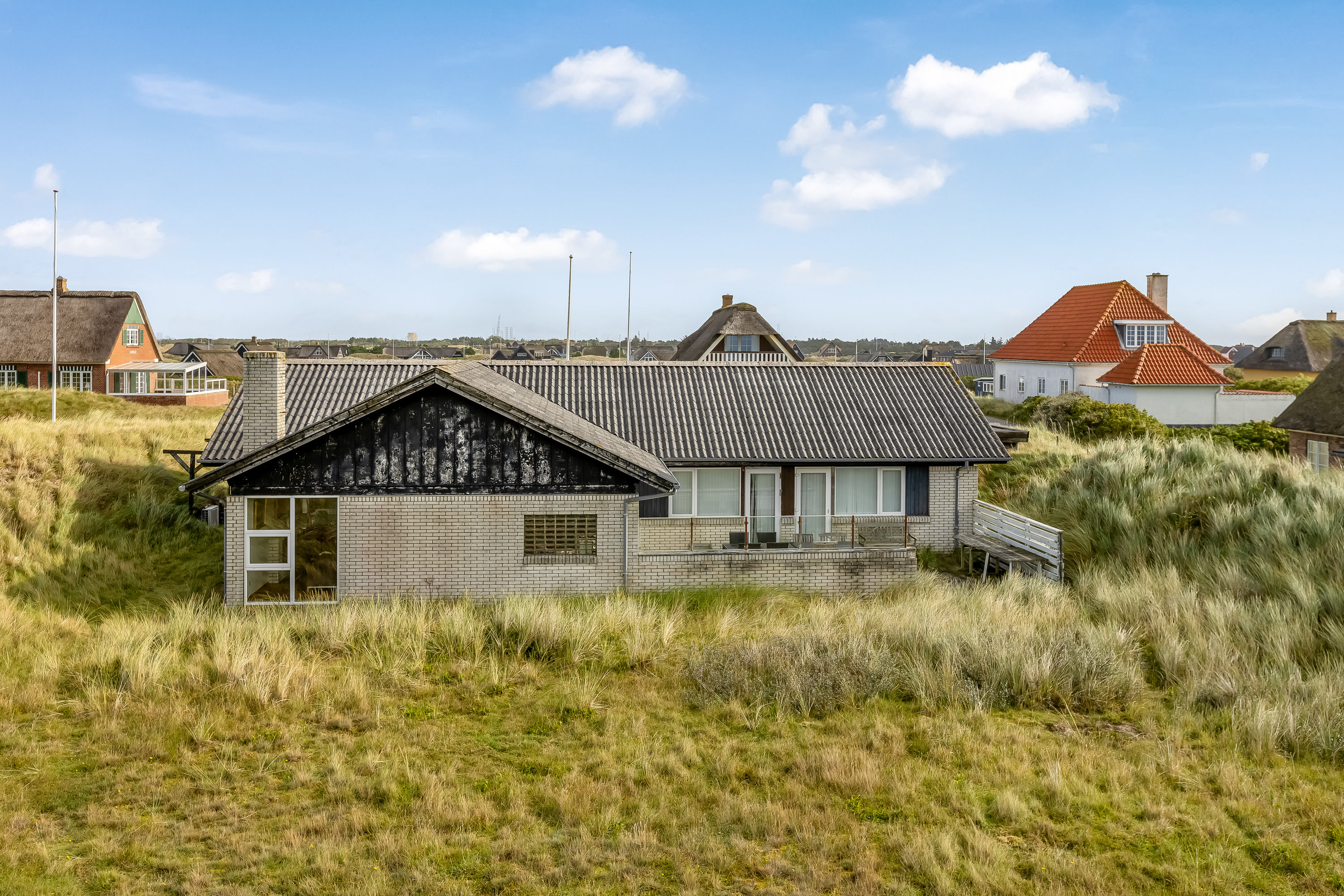 Fremhævet facade billede i fuldskærmstilstand. Billede af Kystvejen 27, Fanø Bad, 6720 Fanø