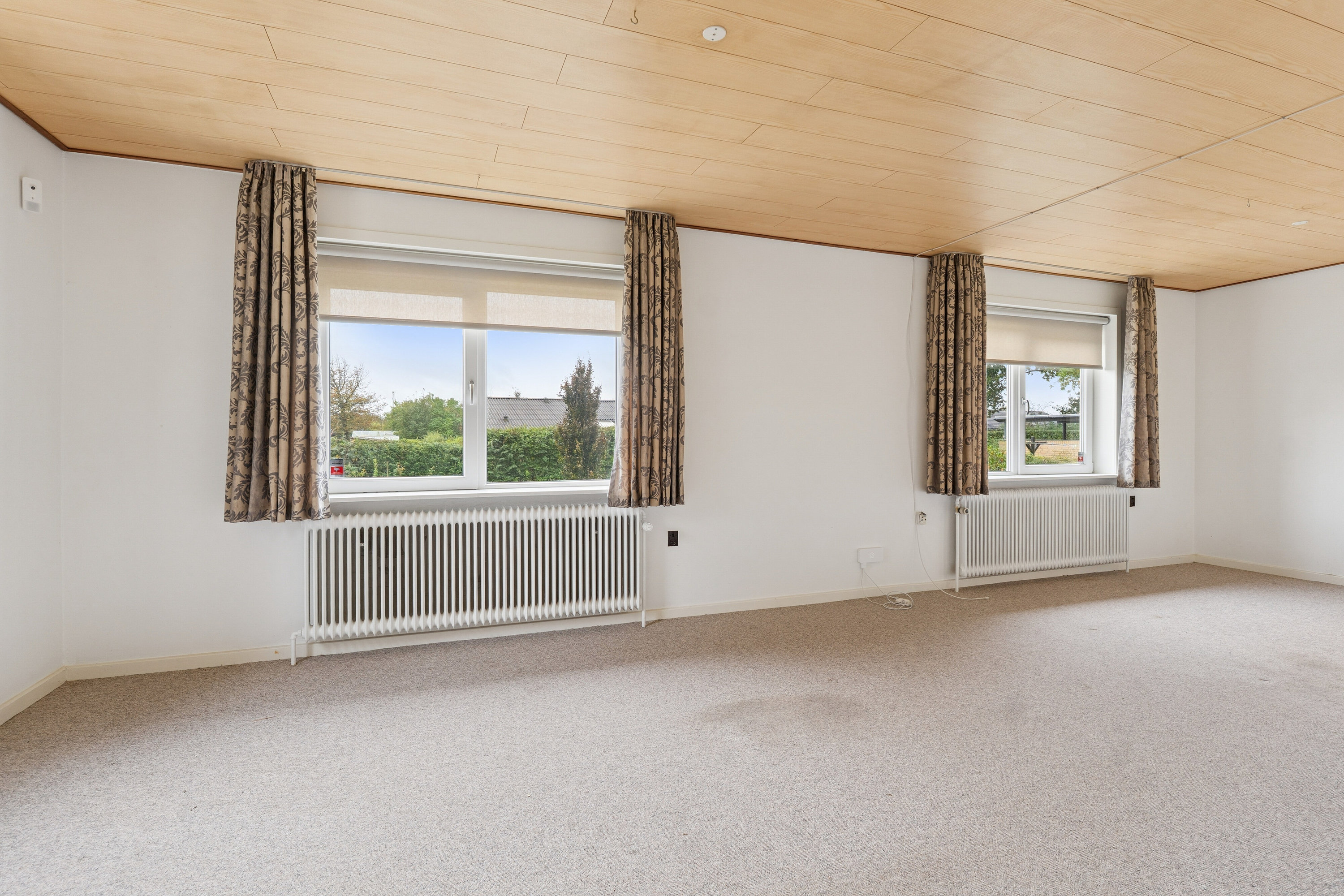 Fremhævet stue billede i fuldskærmstilstand. Billede af Halvorsmindevej 9, 9800 Hjørring