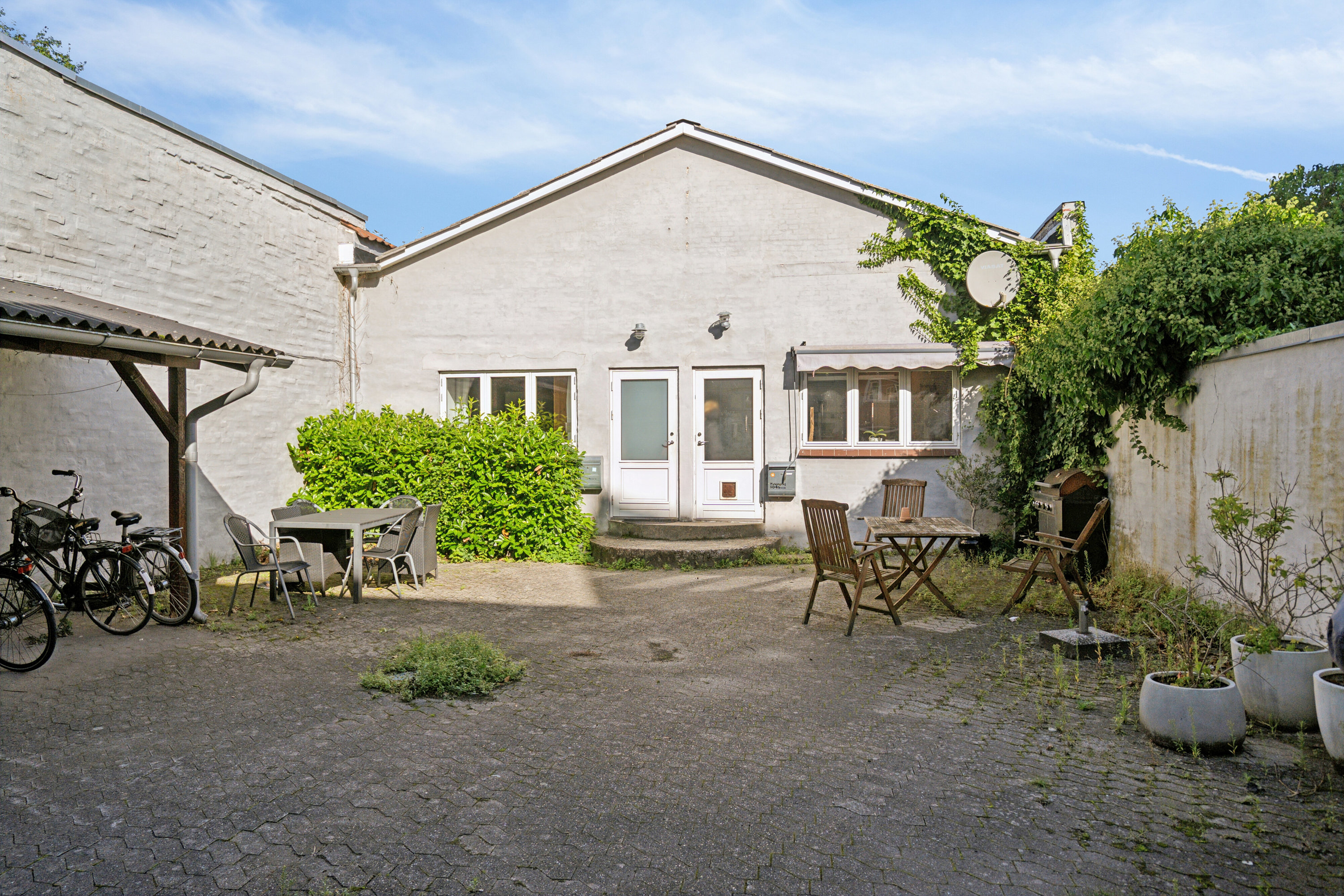 Fremhævet udendørs billede i fuldskærmstilstand. Billede af Nyborgvej 104B, st.. tv., 5000 Odense C