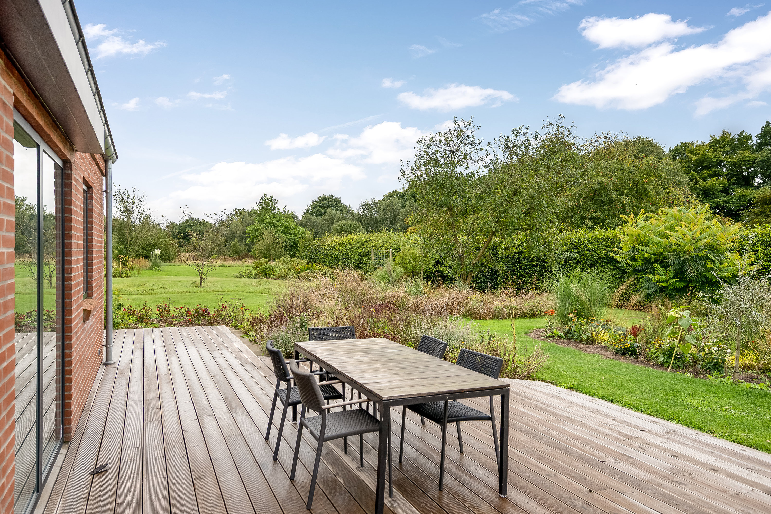 Fremhævet terrasse billede i fuldskærmstilstand. Billede af Midtengvej 3, Ll Emmerske, 6270 Tønder