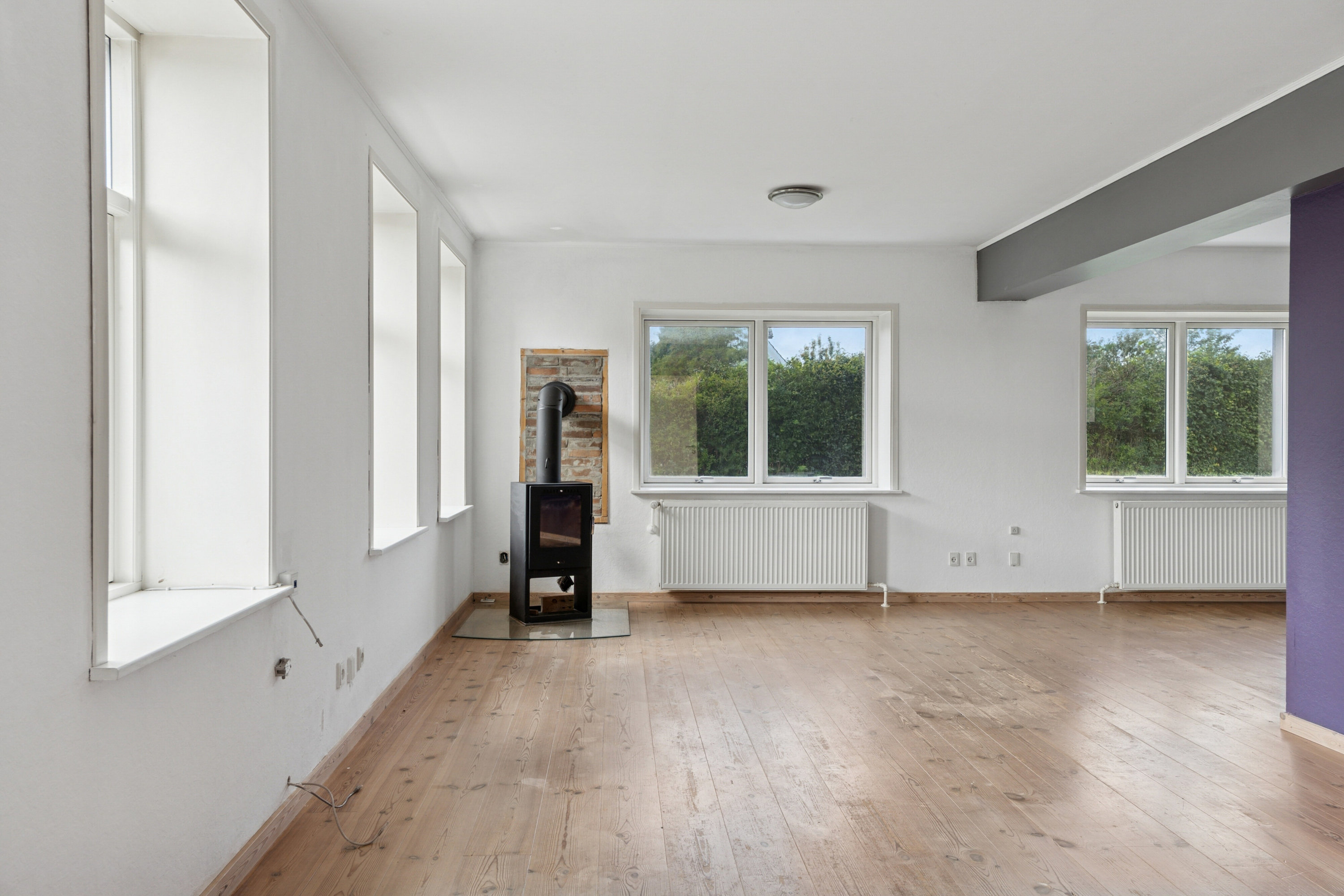 Fremhævet stue billede i fuldskærmstilstand. Billede af Storegade 1, Holbøl, 6340 Kruså