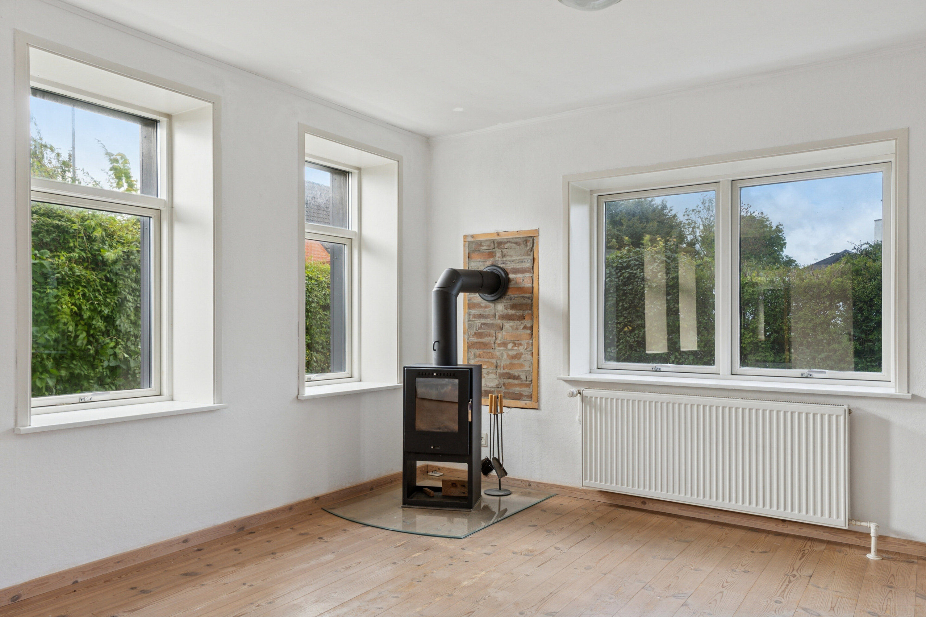 Fremhævet stue billede i fuldskærmstilstand. Billede af Storegade 1, Holbøl, 6340 Kruså