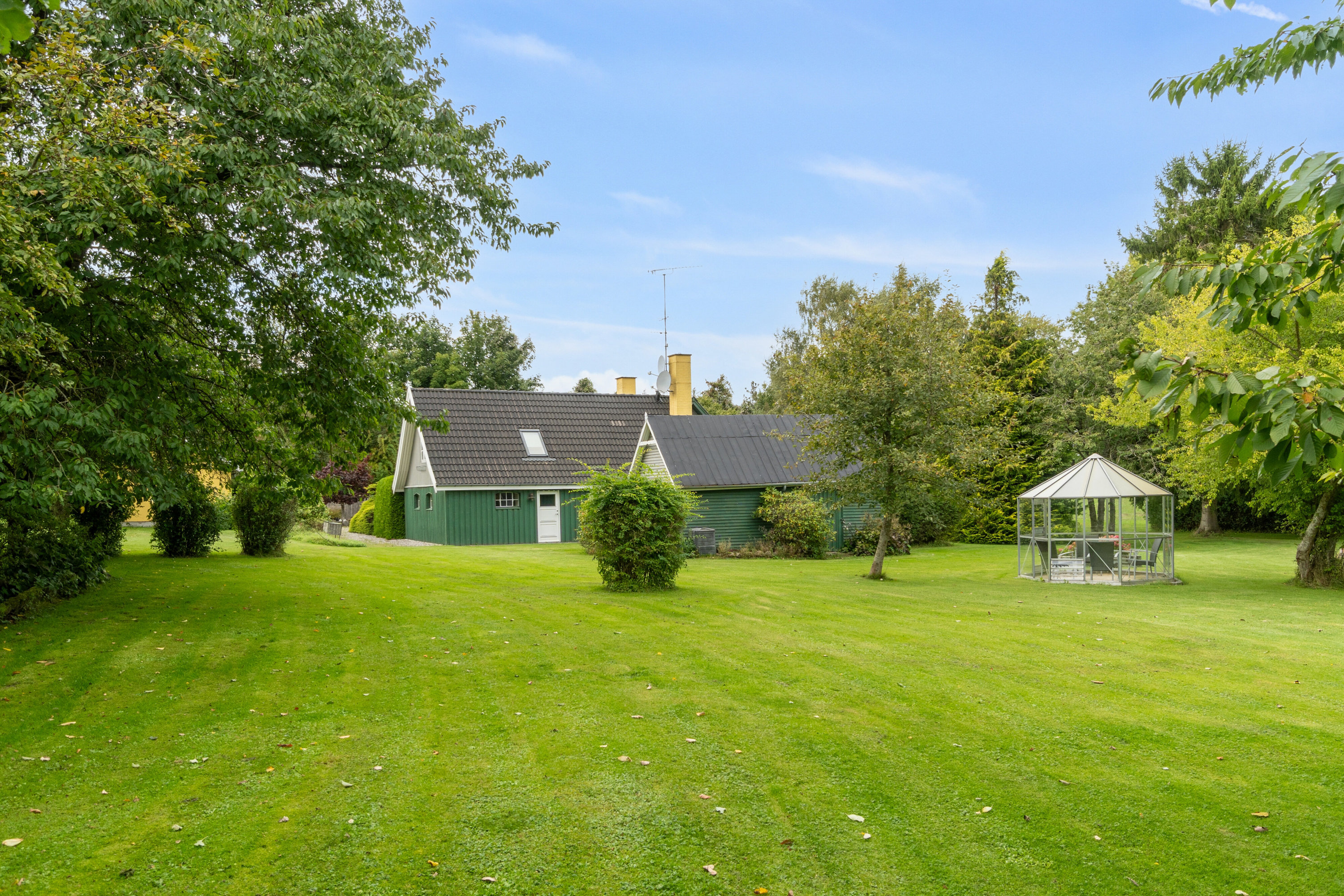 Fremhævet set fra haven billede i fuldskærmstilstand. Billede af Jyderupvej 34, Kongsted, 4683 Rønnede