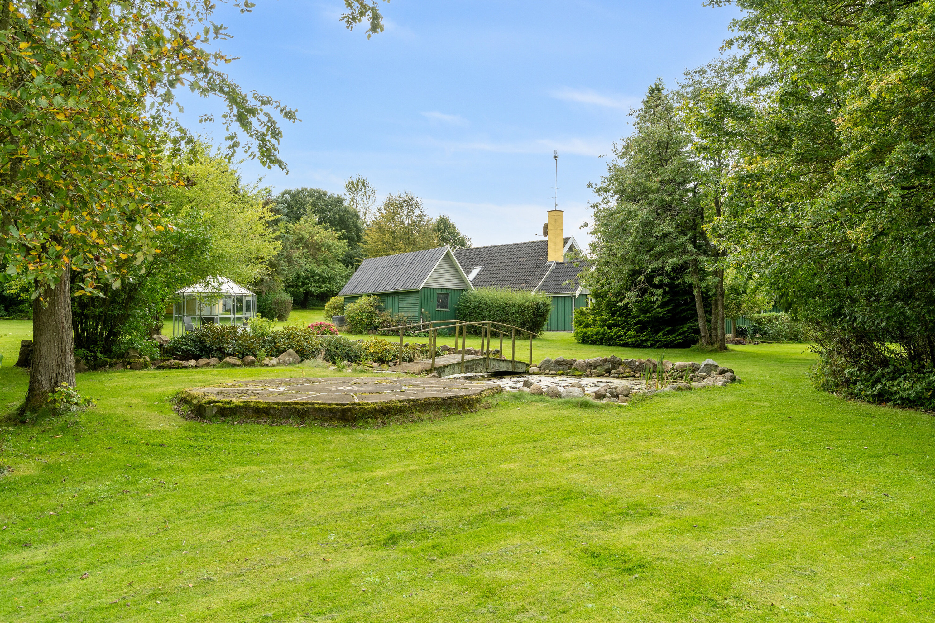 Fremhævet set fra haven billede i fuldskærmstilstand. Billede af Jyderupvej 34, Kongsted, 4683 Rønnede