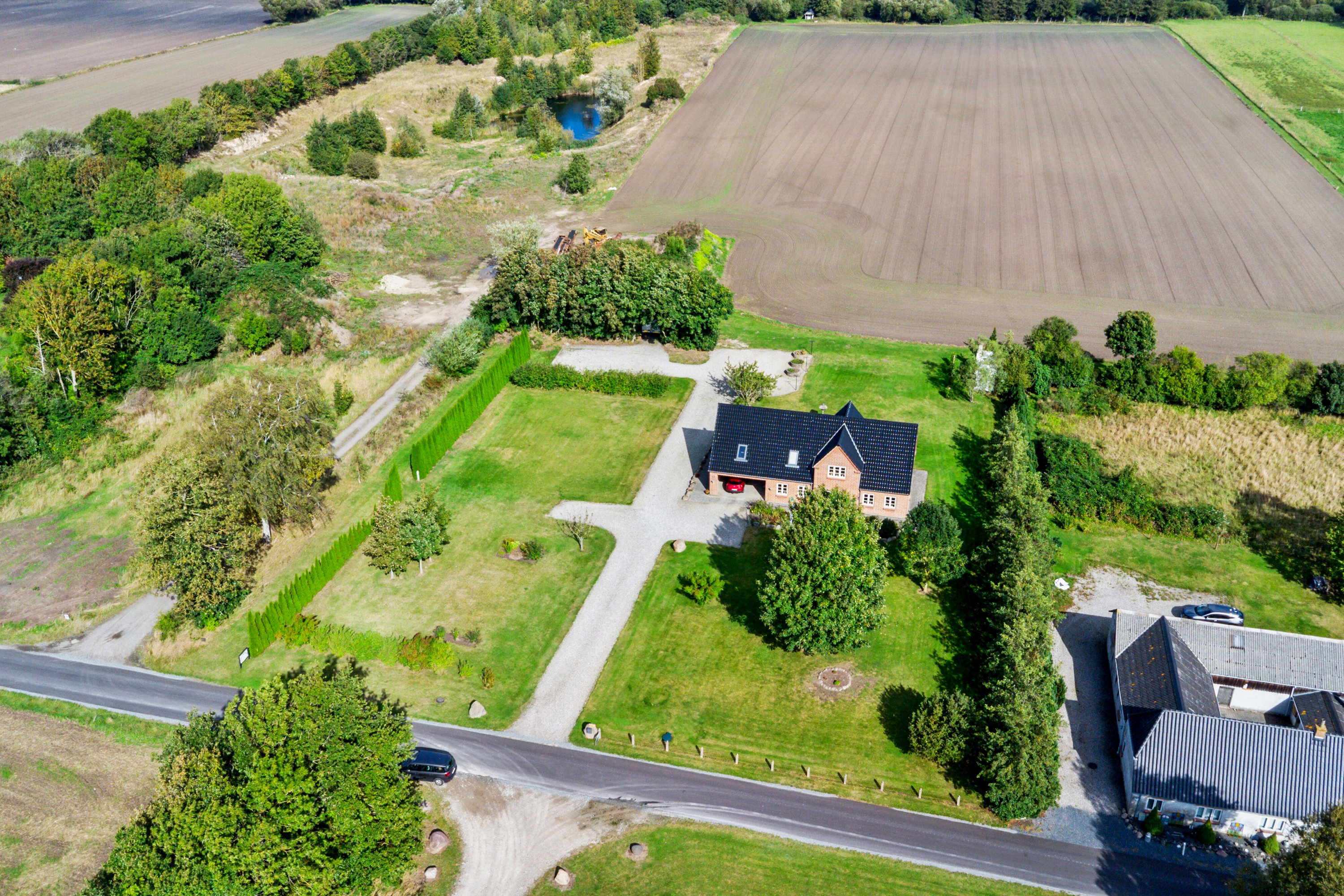 Fremhævet luftfoto billede i fuldskærmstilstand. Billede af P Hansens Gyden 17, Gyngstrup Mark, 5450 Otterup