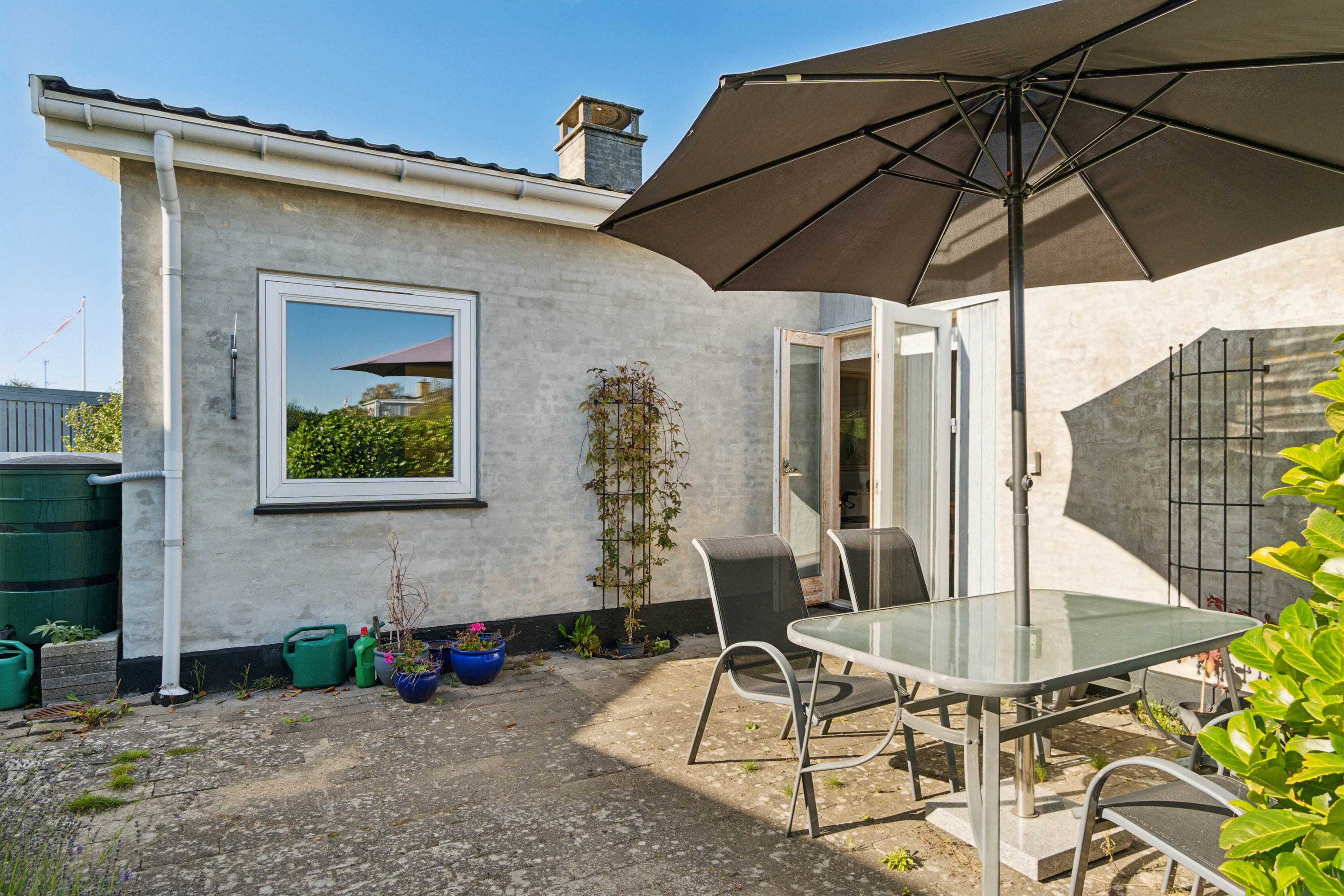 Fremhævet overdækket terrasse billede i fuldskærmstilstand. Billede af Pagteroldvej 63, 2650 Hvidovre