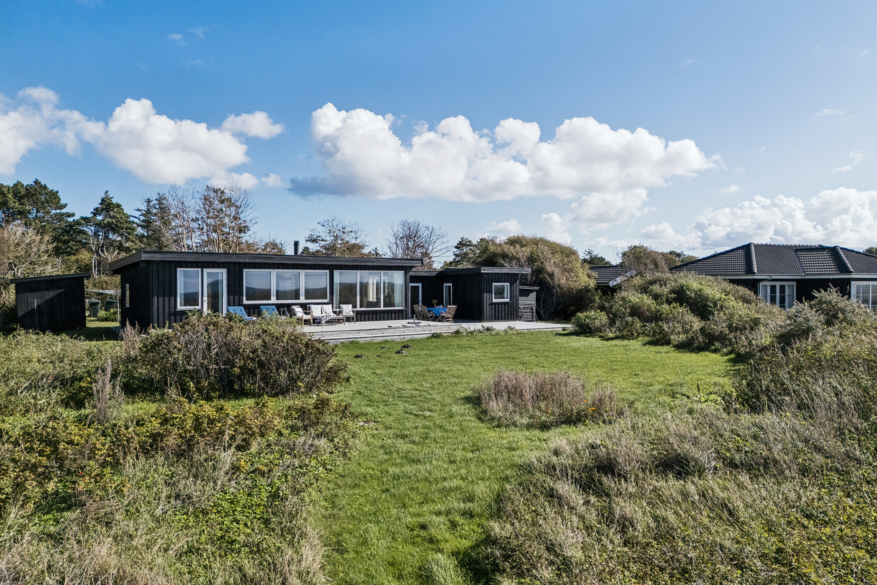 Fremhævet set fra haven billede i fuldskærmstilstand. Billede af Duevej 35, Yderby Lyng, 4583 Sjællands Odde