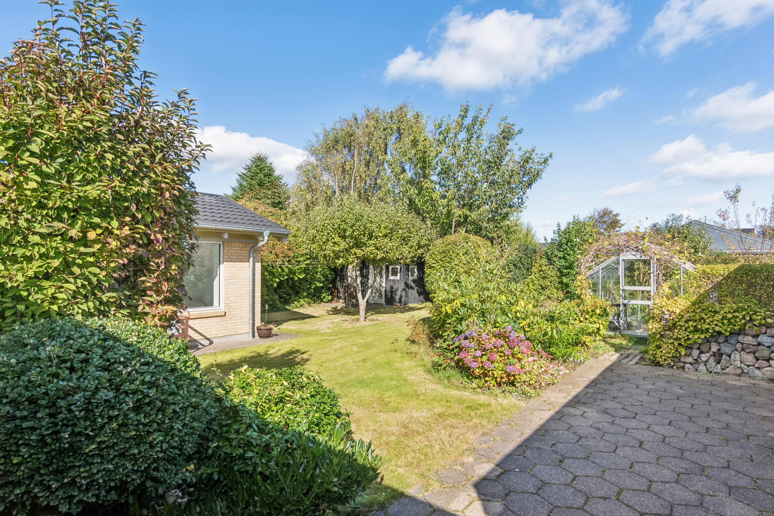 Fremhævet set fra haven billede i fuldskærmstilstand. Billede af Enebærvænget 3, Tingstrup, 7700 Thisted