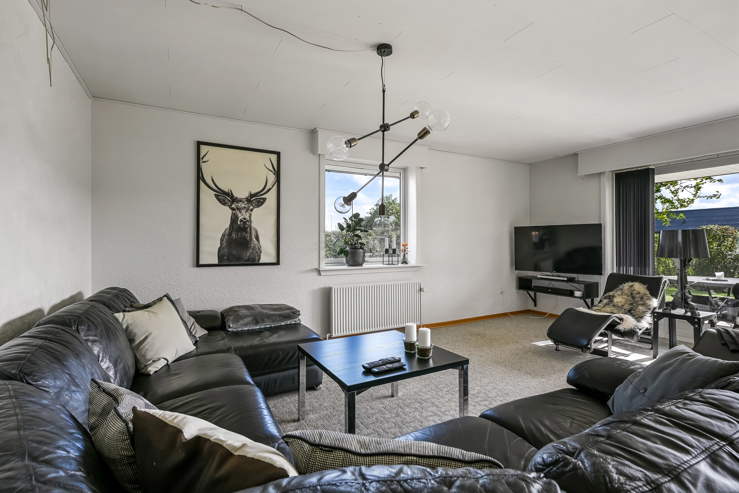 Fremhævet stue billede i fuldskærmstilstand. Billede af Ågeslundvej 3, 7200 Grindsted