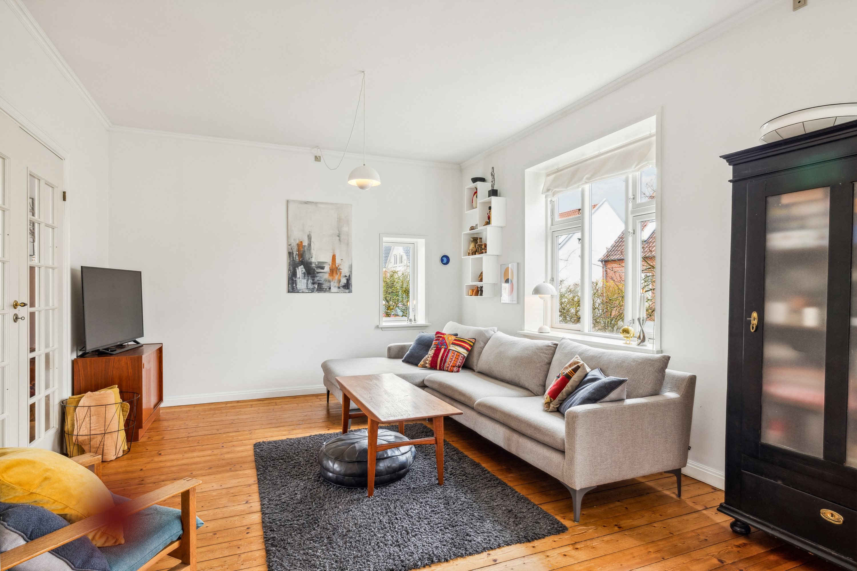 Fremhævet stue billede i fuldskærmstilstand. Billede af Egholmsvej 8, 8660 Skanderborg