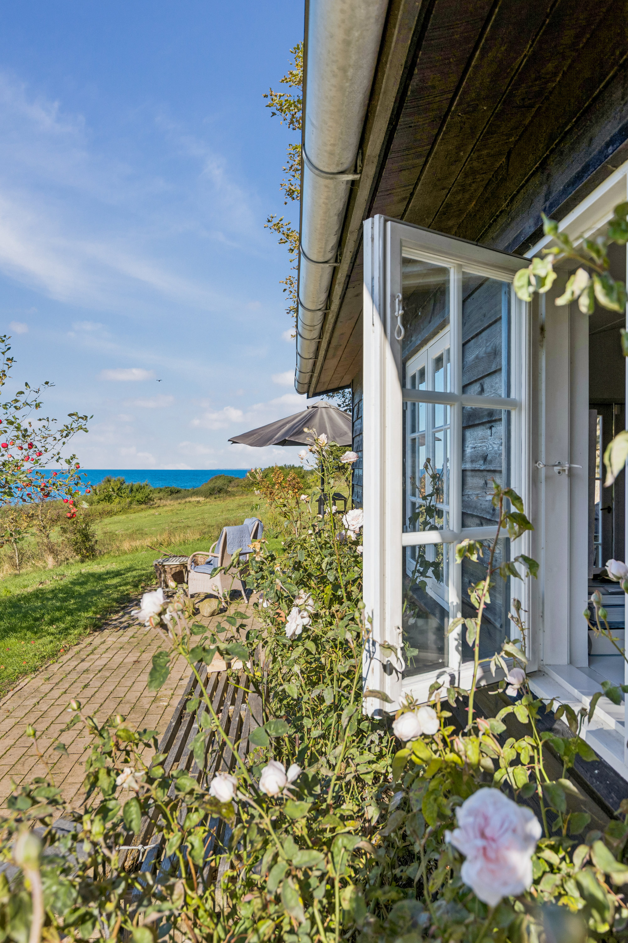 Fremhævet terrasse billede i fuldskærmstilstand. Billede af Vindekilde Strandvej 28, Bjergene, 4540 Fårevejle