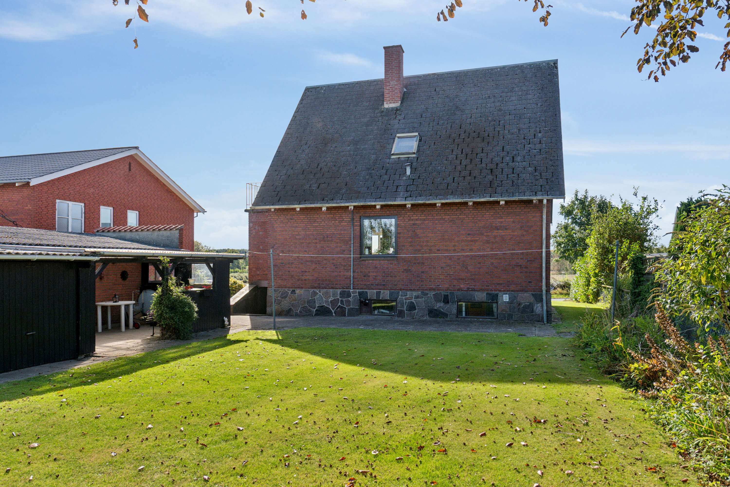 Fremhævet set fra haven billede i fuldskærmstilstand. Billede af Assensvej 24, Kirkeby, 5771 Stenstrup