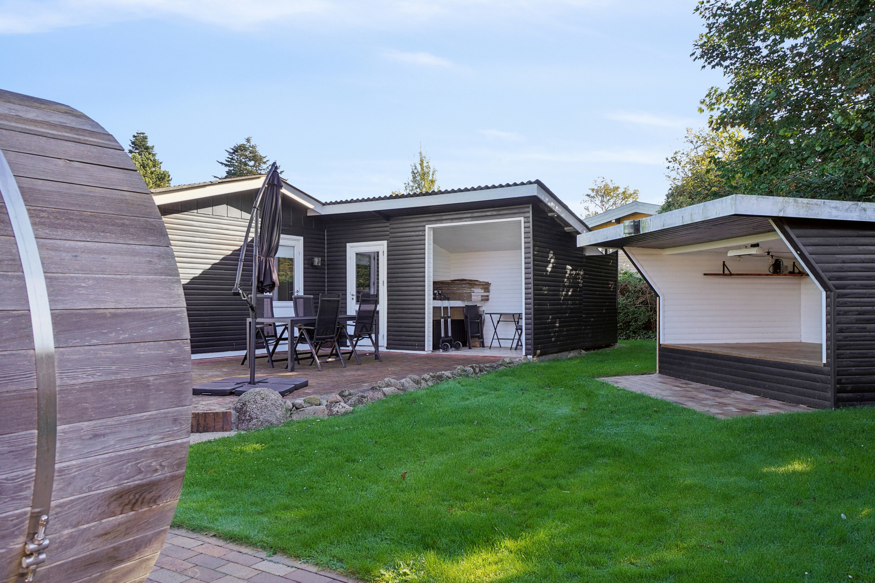 Fremhævet set fra haven billede i fuldskærmstilstand. Billede af Mellemvang 4, Ejby, 4070 Kirke Hyllinge