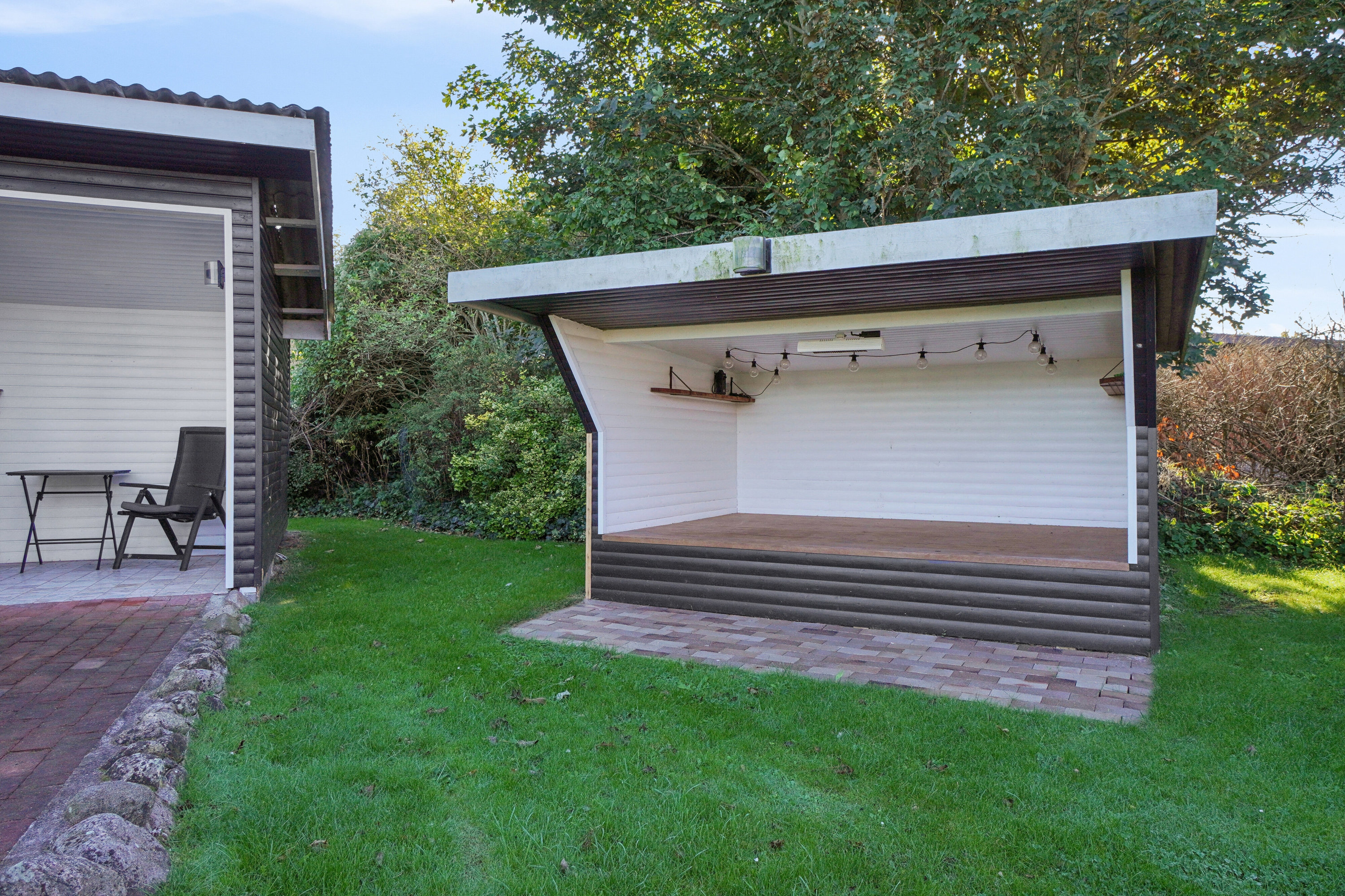 Fremhævet set fra haven billede i fuldskærmstilstand. Billede af Mellemvang 4, Ejby, 4070 Kirke Hyllinge