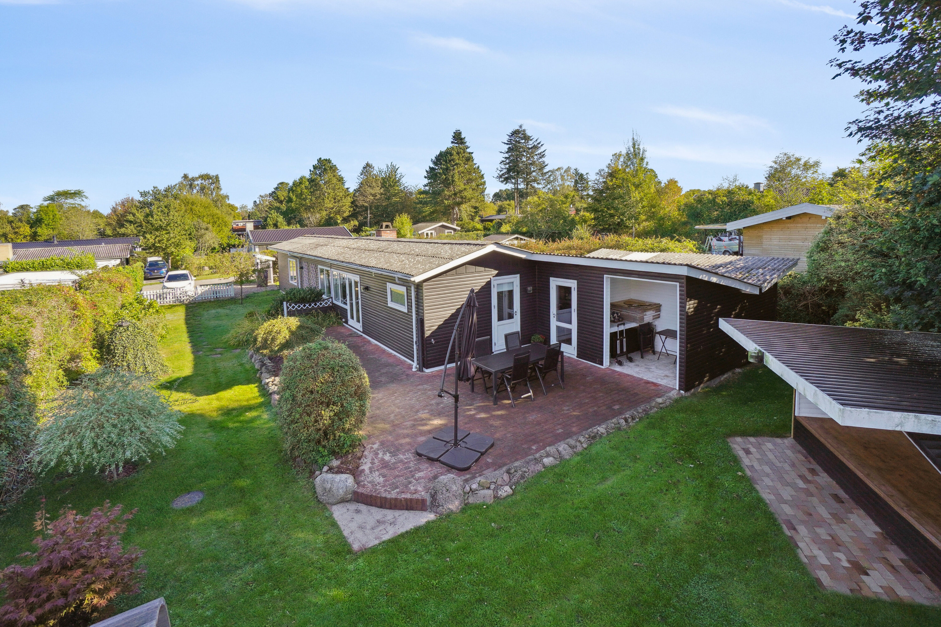 Fremhævet set fra haven billede i fuldskærmstilstand. Billede af Mellemvang 4, Ejby, 4070 Kirke Hyllinge