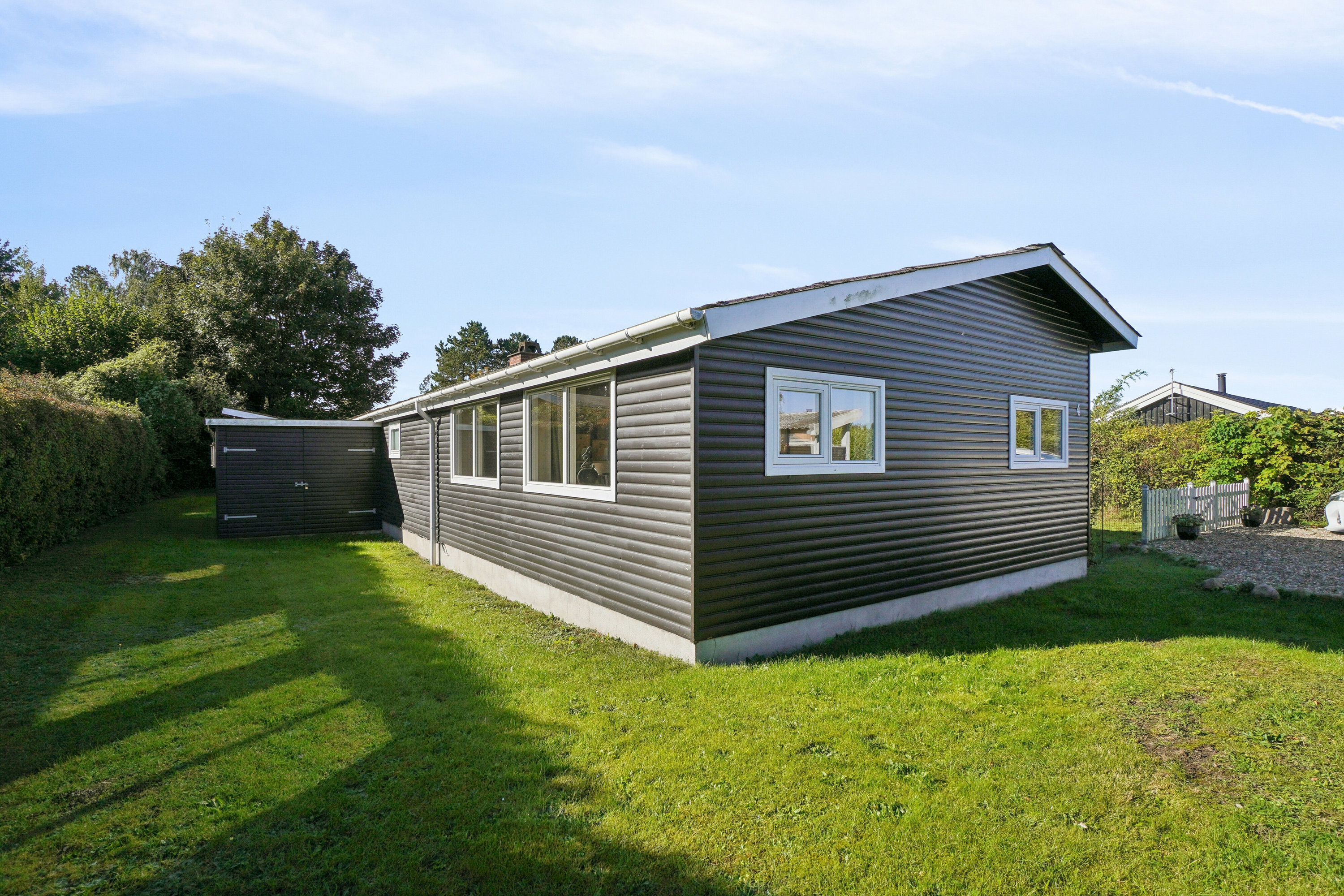 Fremhævet set fra haven billede i fuldskærmstilstand. Billede af Mellemvang 4, Ejby, 4070 Kirke Hyllinge