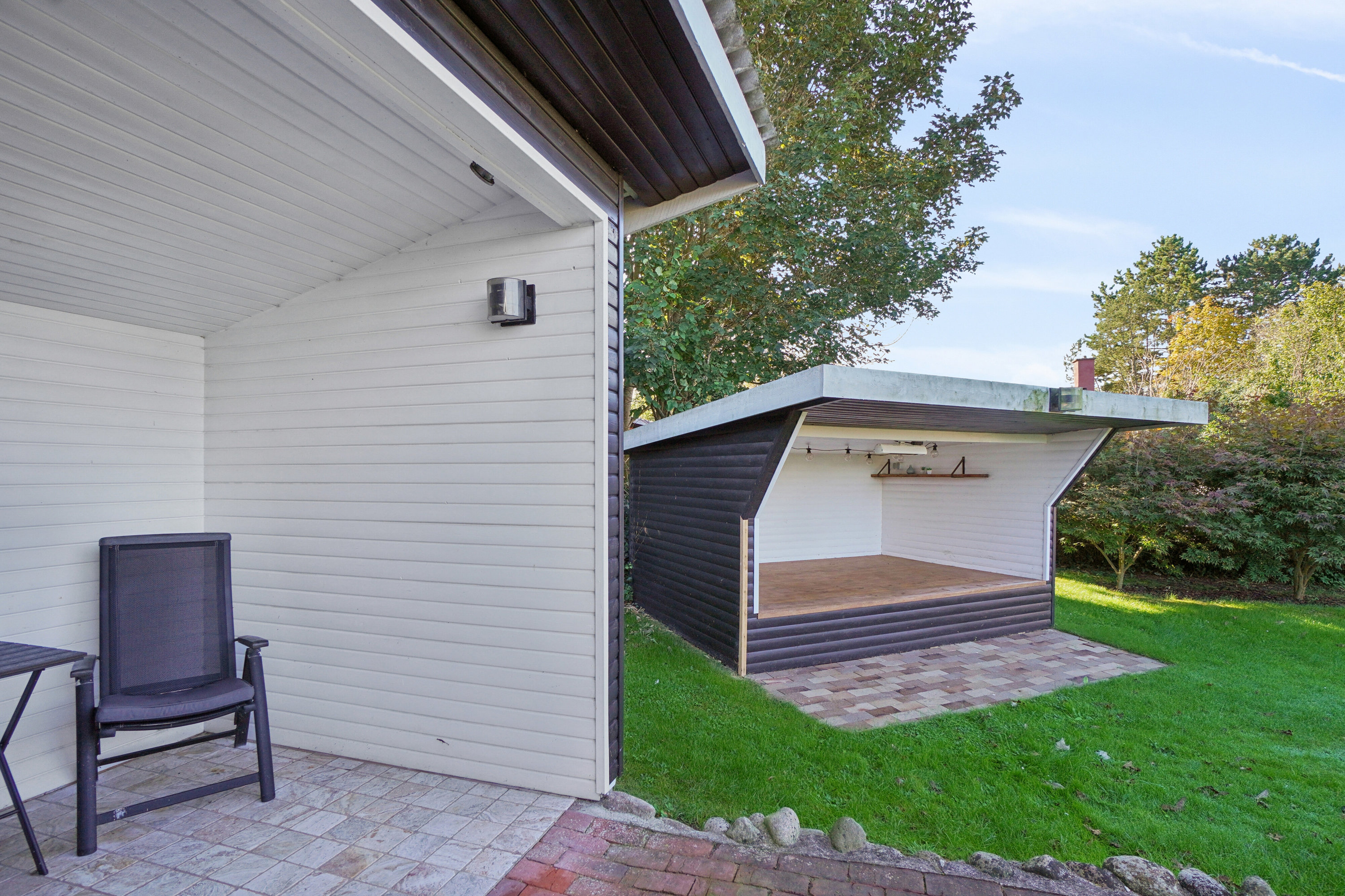 Fremhævet set fra haven billede i fuldskærmstilstand. Billede af Mellemvang 4, Ejby, 4070 Kirke Hyllinge