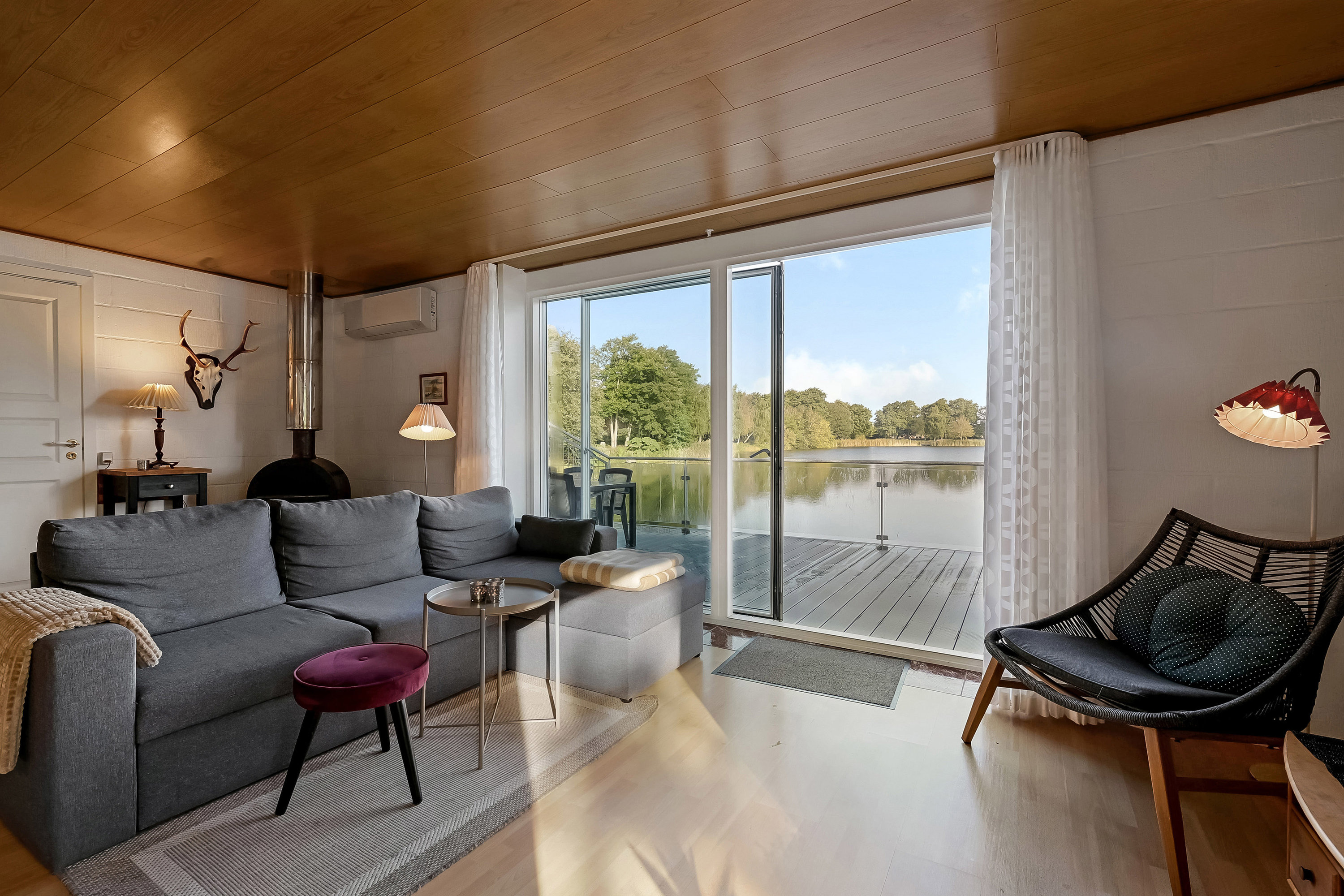 Fremhævet stue billede i fuldskærmstilstand. Billede af Tangsgårdsvej 3, Bur, 7570 Vemb