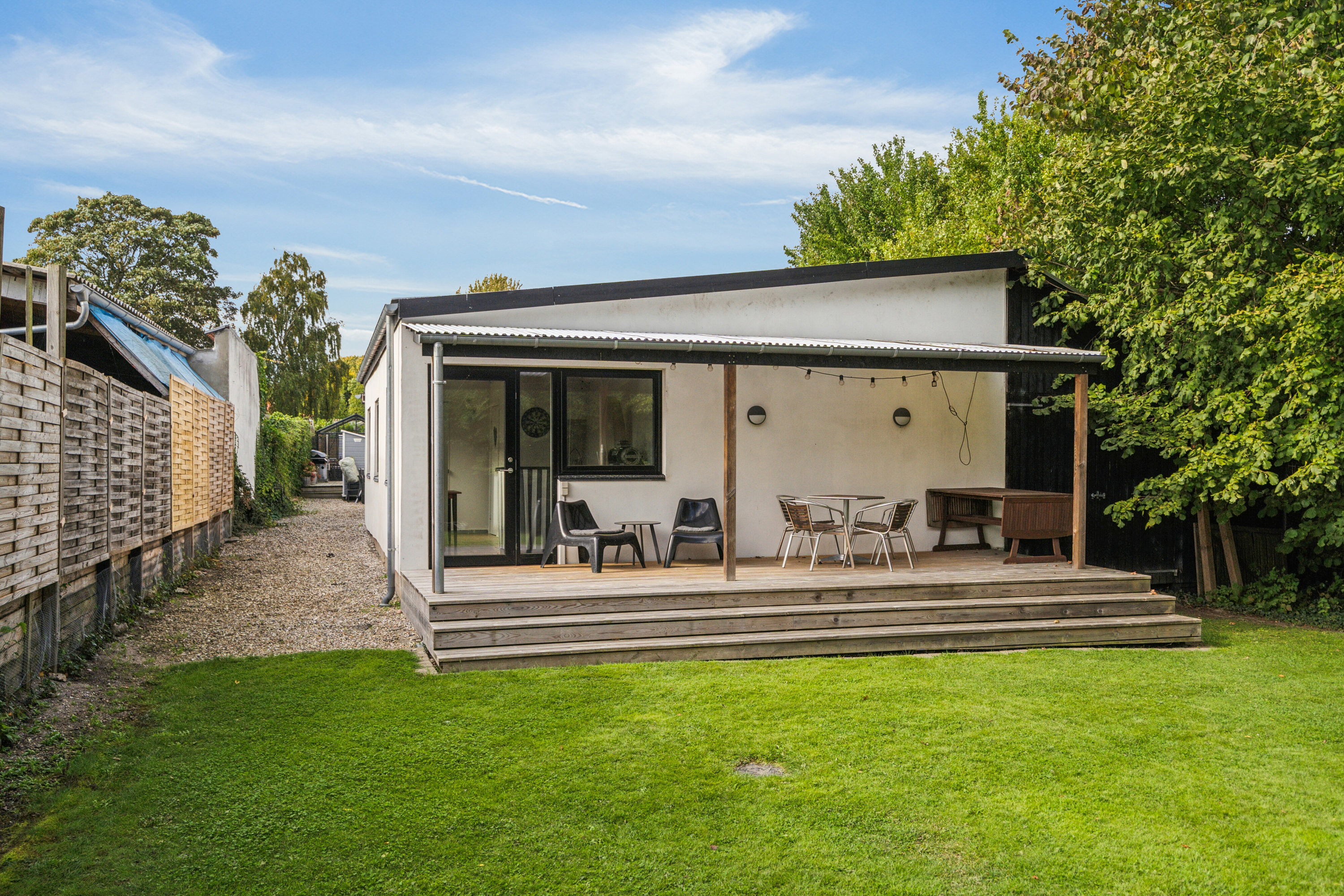 Fremhævet set fra haven billede i fuldskærmstilstand. Billede af Lumbyvej 55, 5000 Odense C