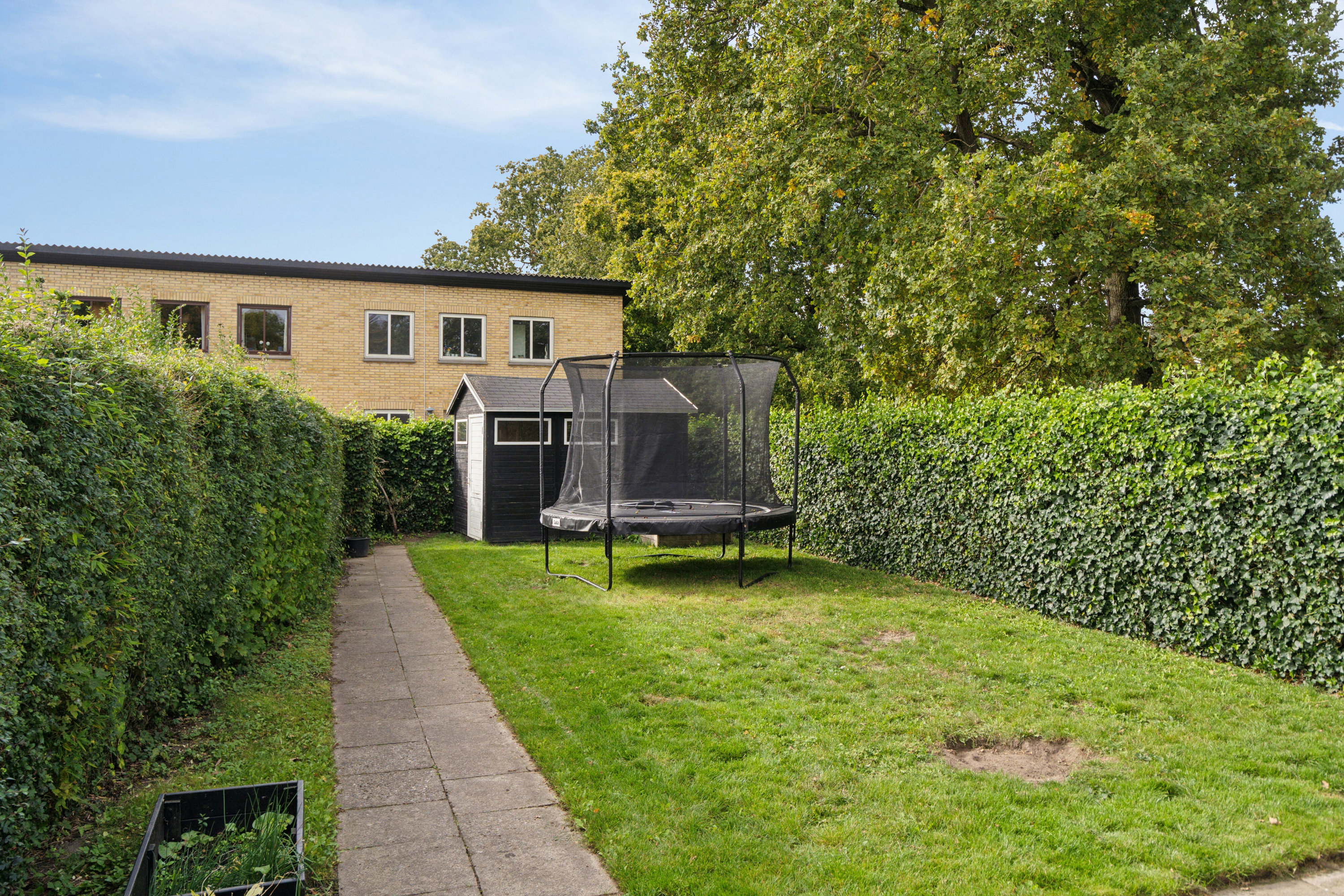 Fremhævet set fra haven billede i fuldskærmstilstand. Billede af Carlsen-Skiødts Vej 25, 5220 Odense SØ