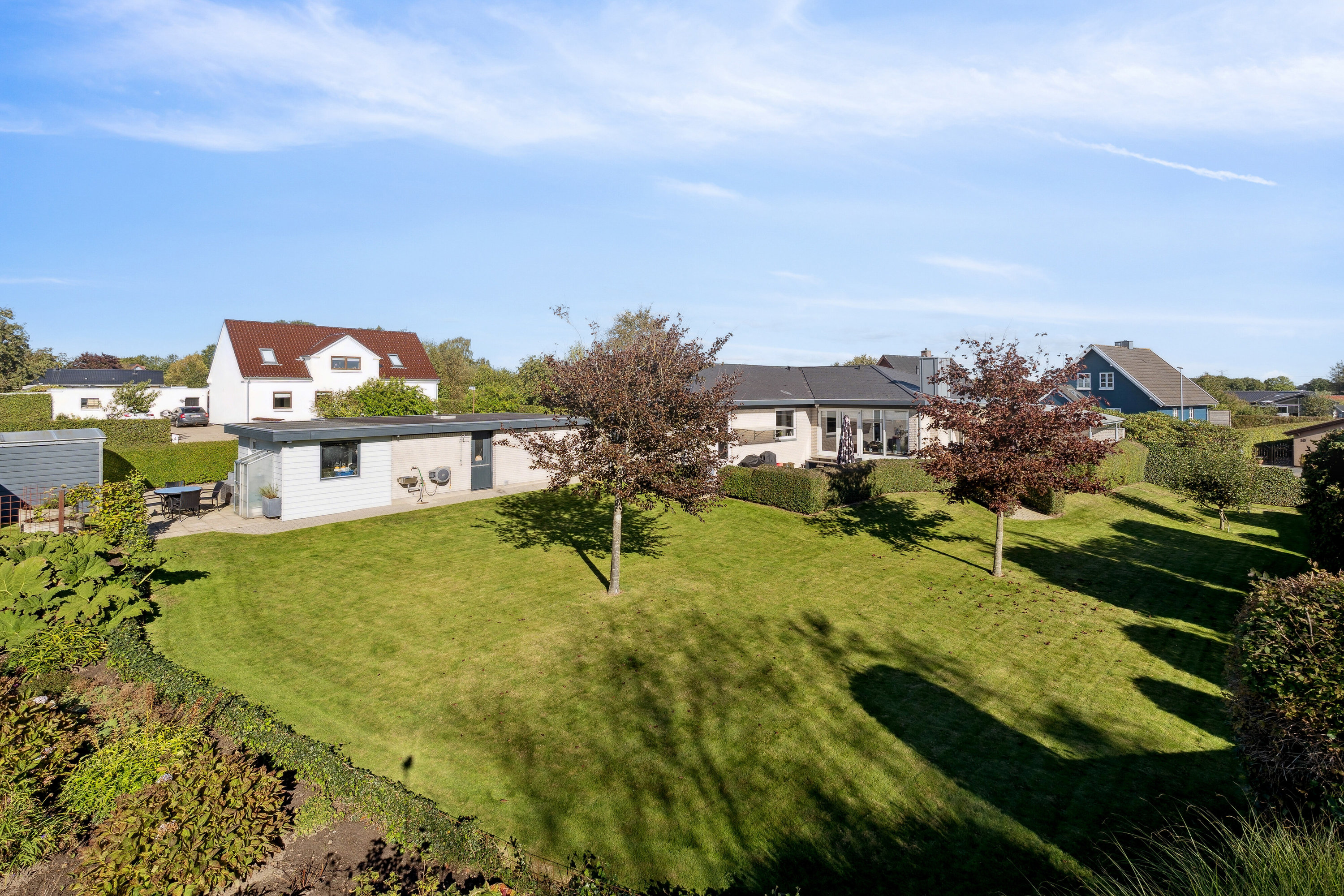 Fremhævet set fra haven billede i fuldskærmstilstand. Billede af Liljevej 1, Vinderslev, 8620 Kjellerup