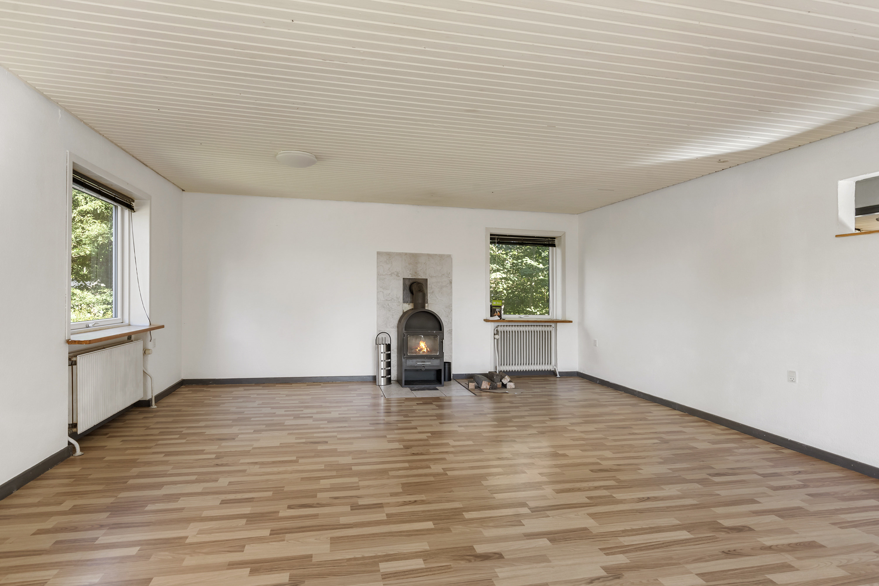 Fremhævet stue billede i fuldskærmstilstand. Billede af Svoldrupvej 105, Vognsild, 9600 Aars