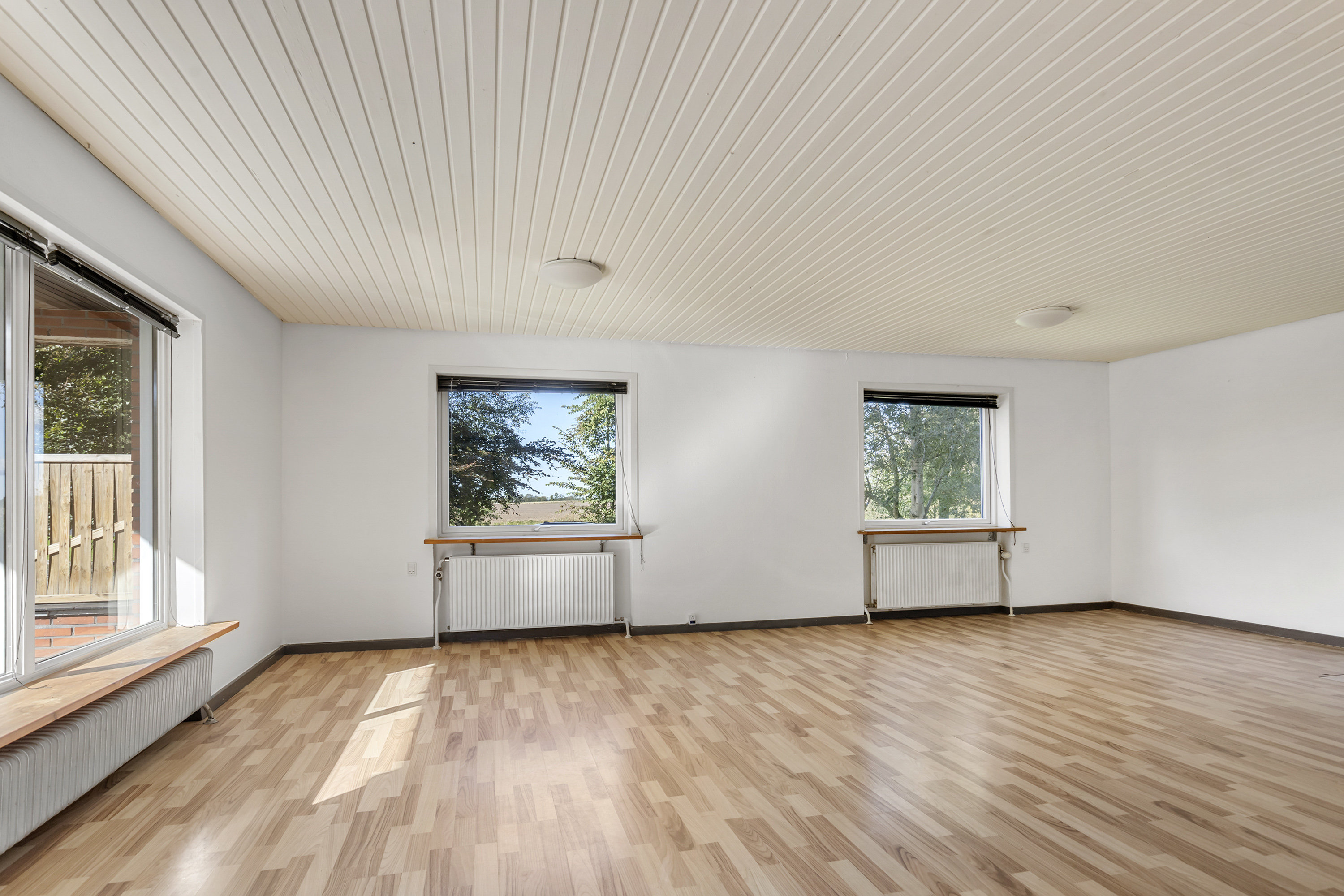 Fremhævet stue billede i fuldskærmstilstand. Billede af Svoldrupvej 105, Vognsild, 9600 Aars