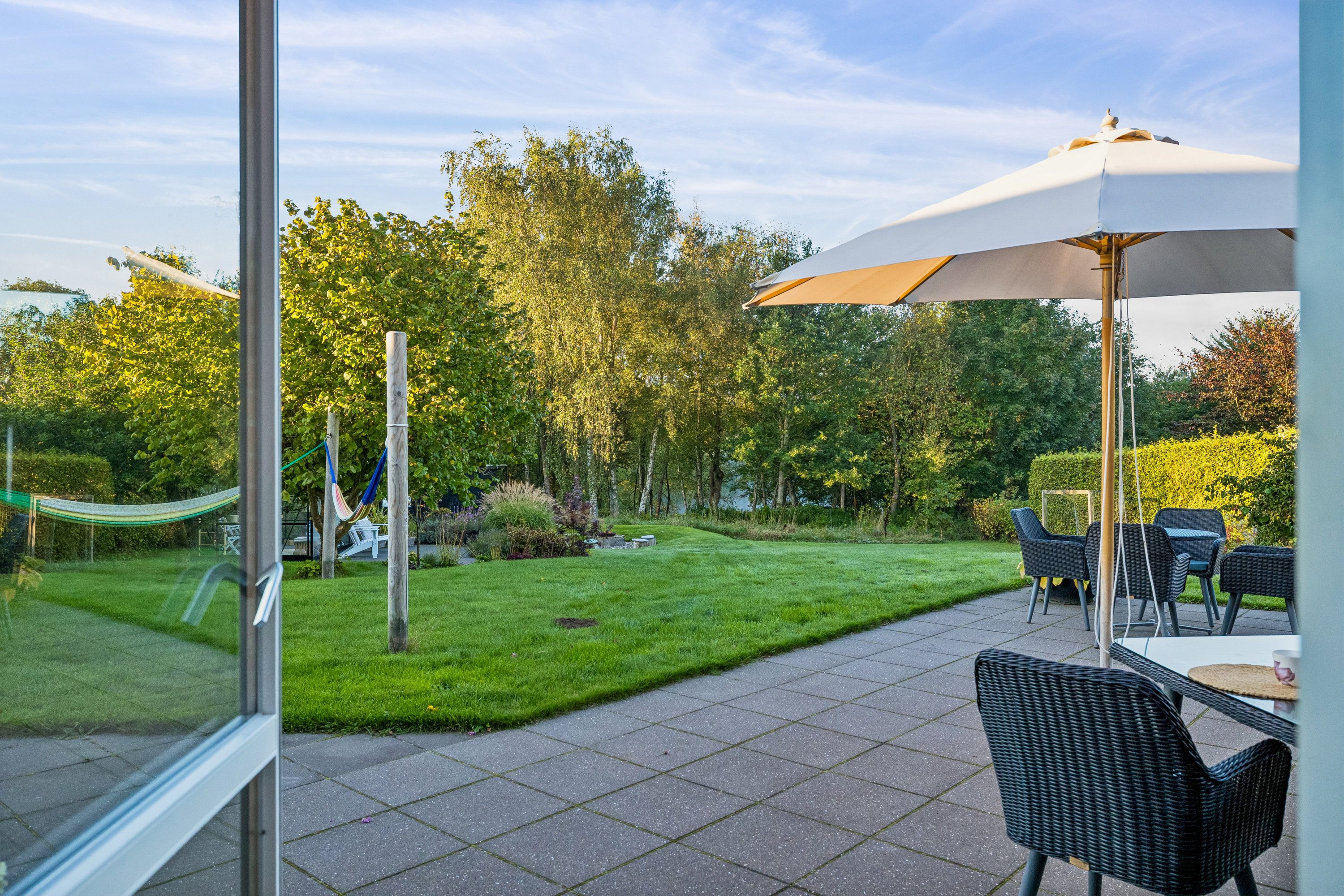 Fremhævet terrasse billede i fuldskærmstilstand. Billede af Granvænget 15, 8990 Fårup